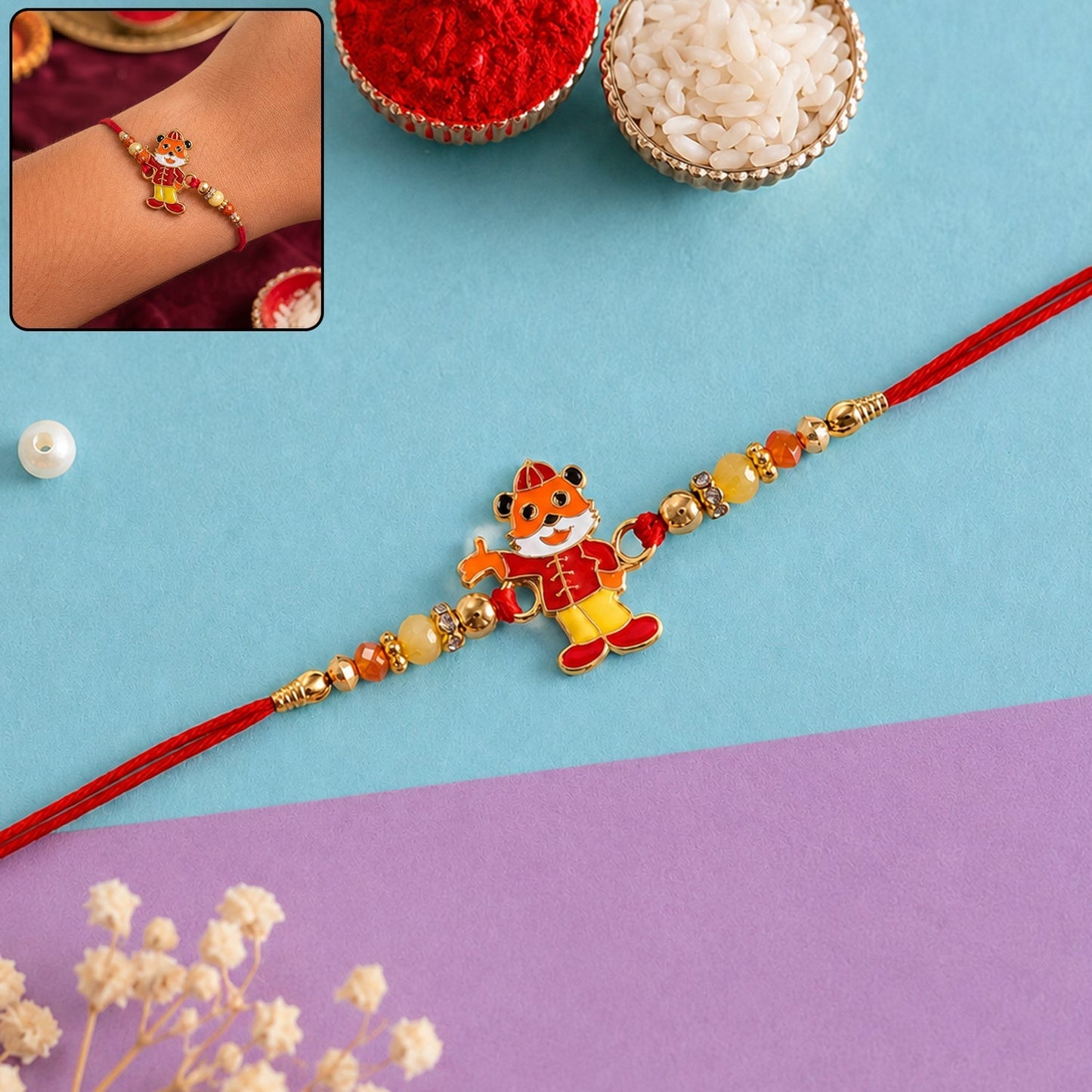 Vibrant designer rakhi with character charm and decorative thread for brother
