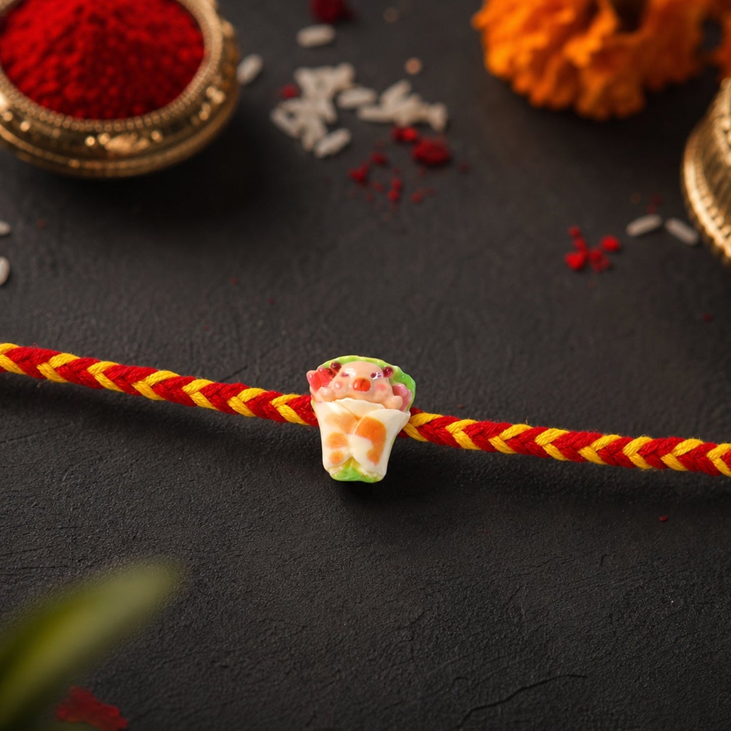 Close-up of neat finishing on designer Rakhi