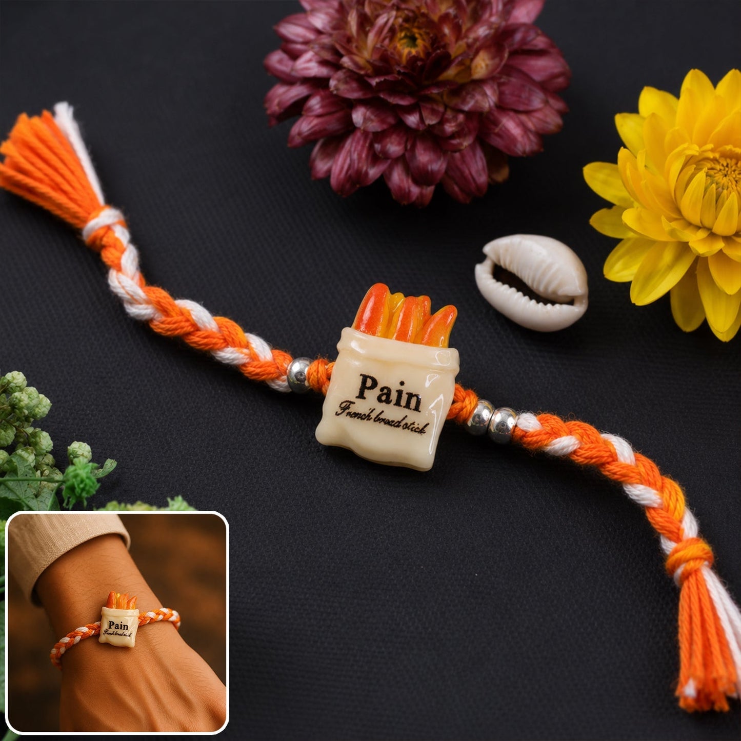 Close-up of food-themed fancy dori rakhi design with vibrant colors