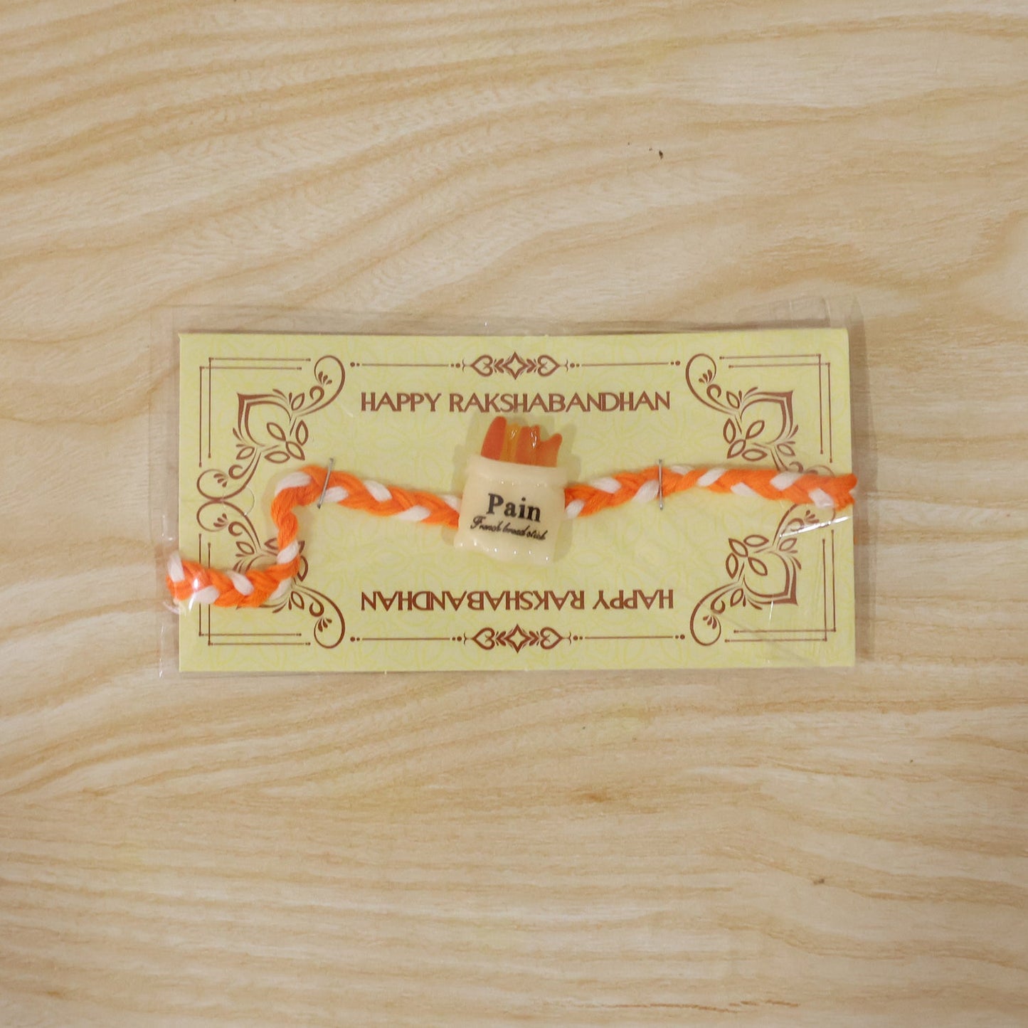 Neat finishing on stylish food-themed fancy designer rakhi