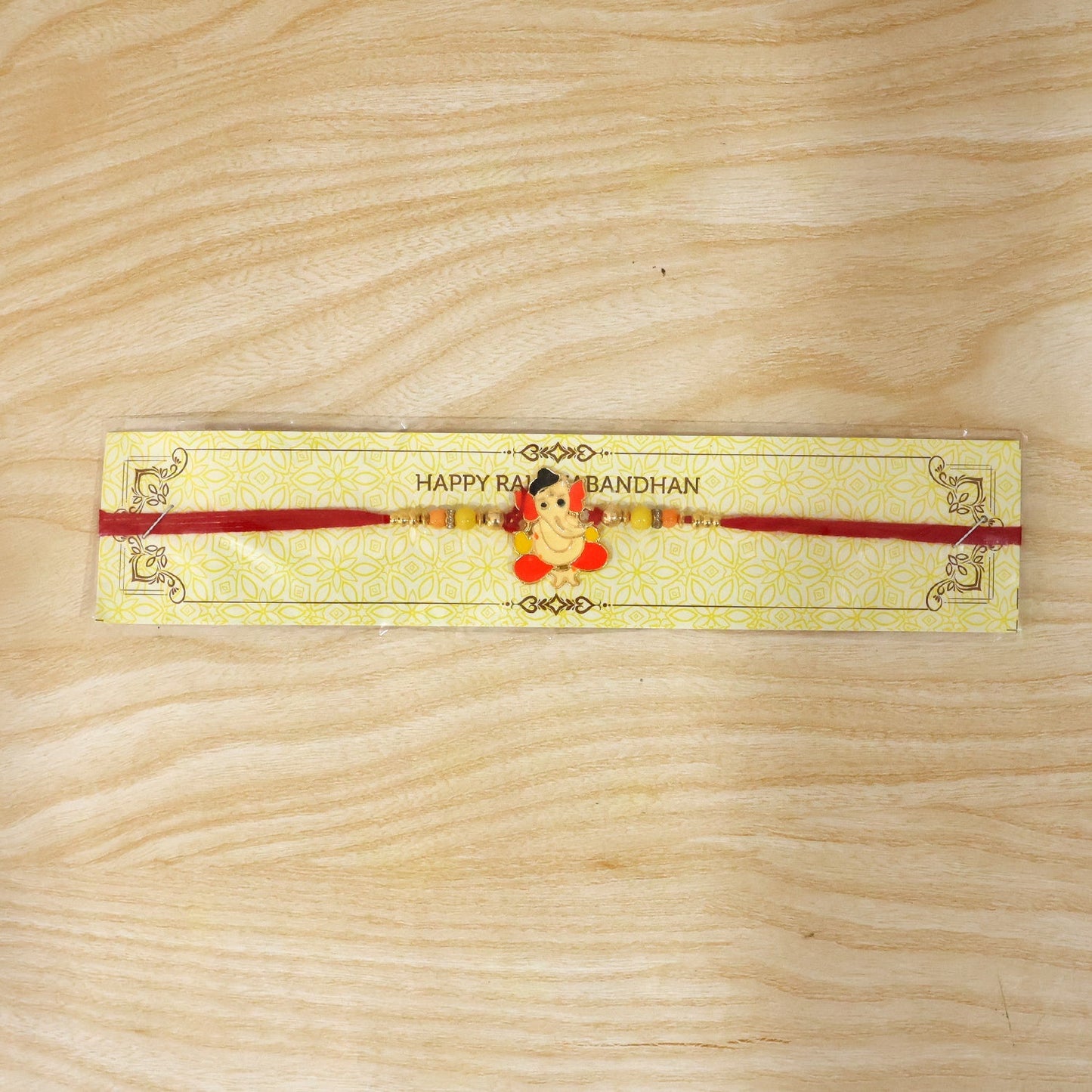 Decorative divine idol rakhi ready to tie on wrist