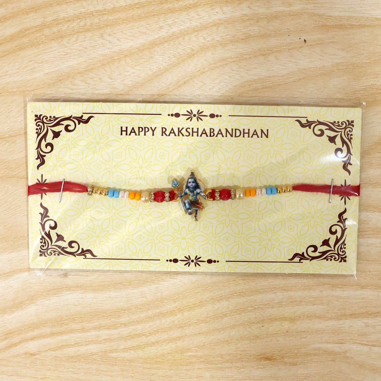 Premium Rakhi with Mahadev idol and detailed beads close-up