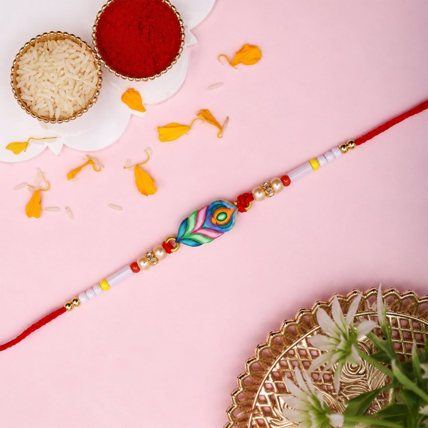 Side view of colorful Mor Pankh beaded rakhi with intricate details