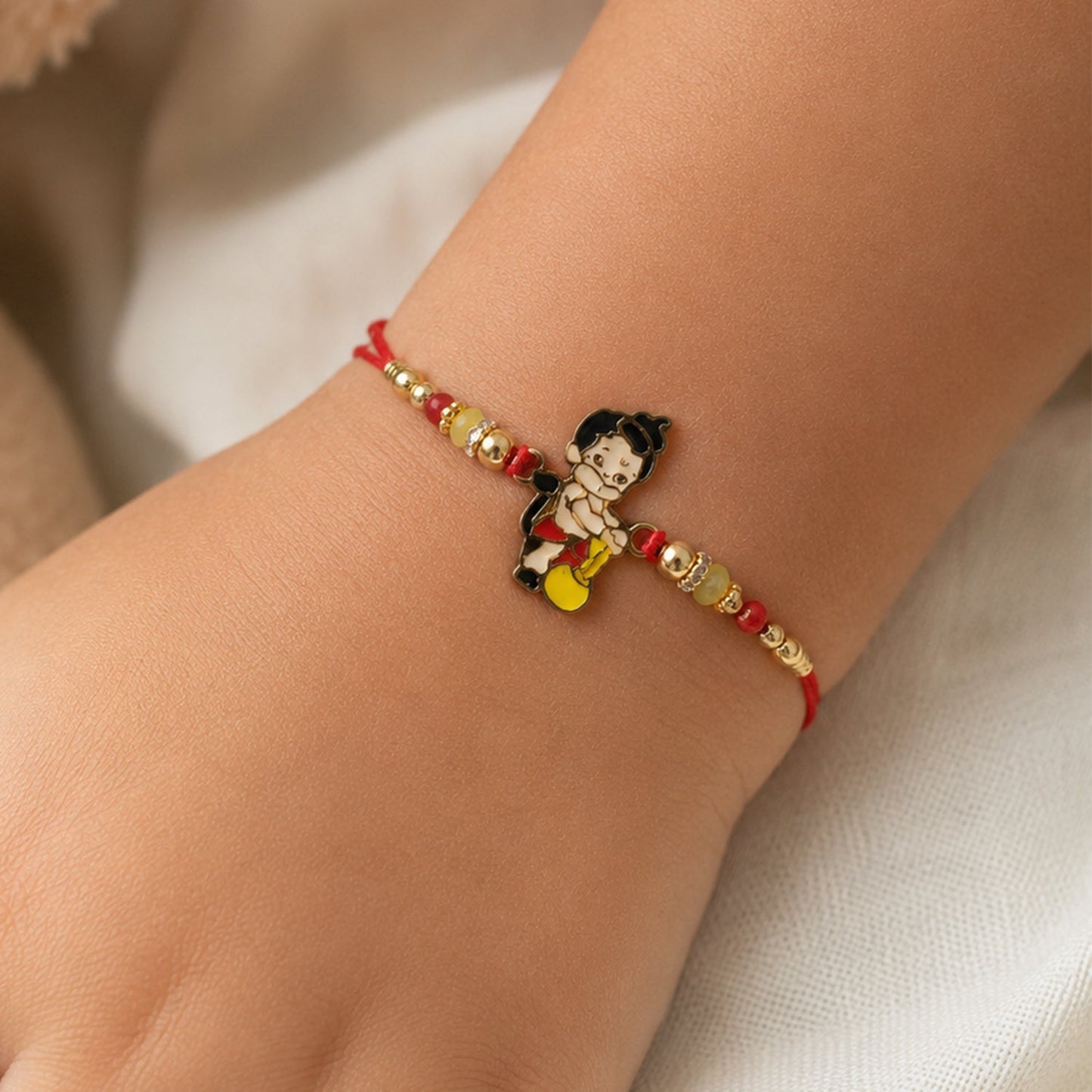 Side view of Bal Hanuman Gada charm Rakhi bead