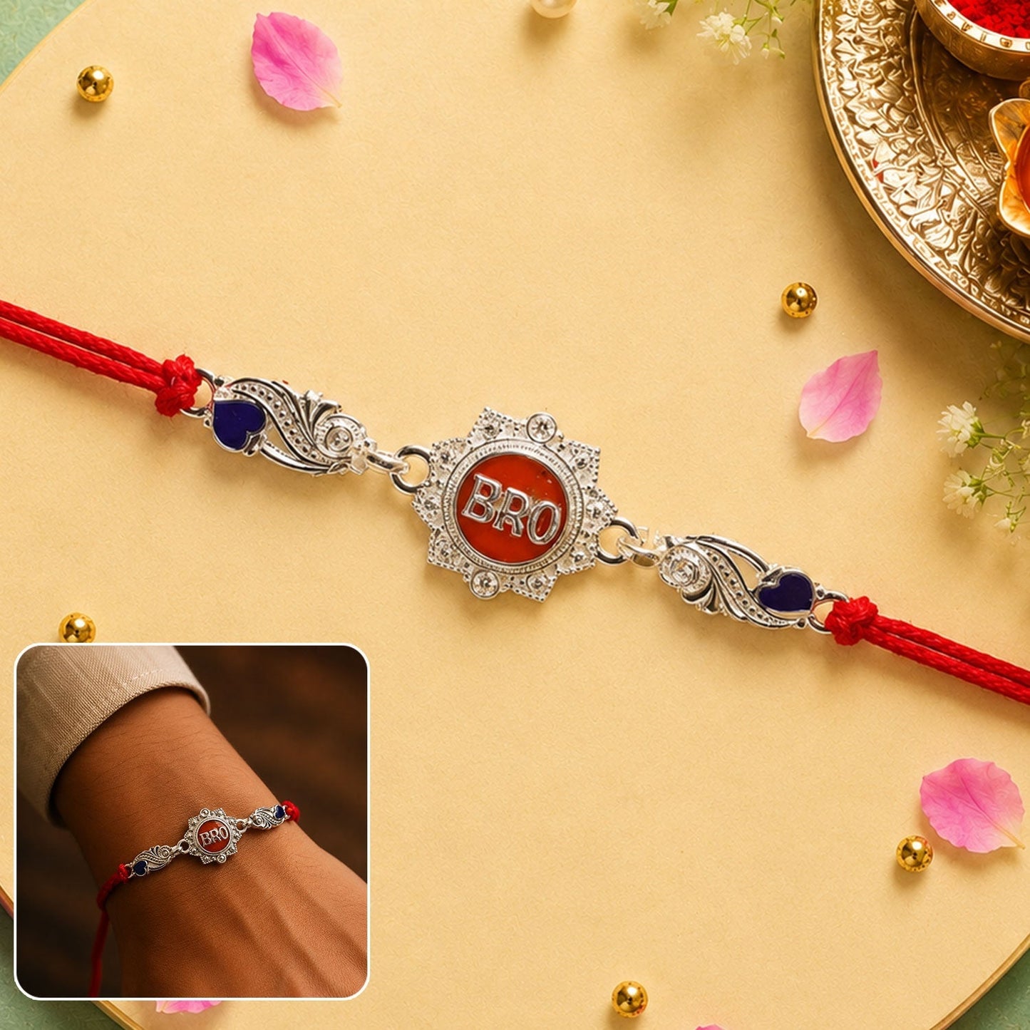 Stylish Bros Rakhi with red thread on white background
