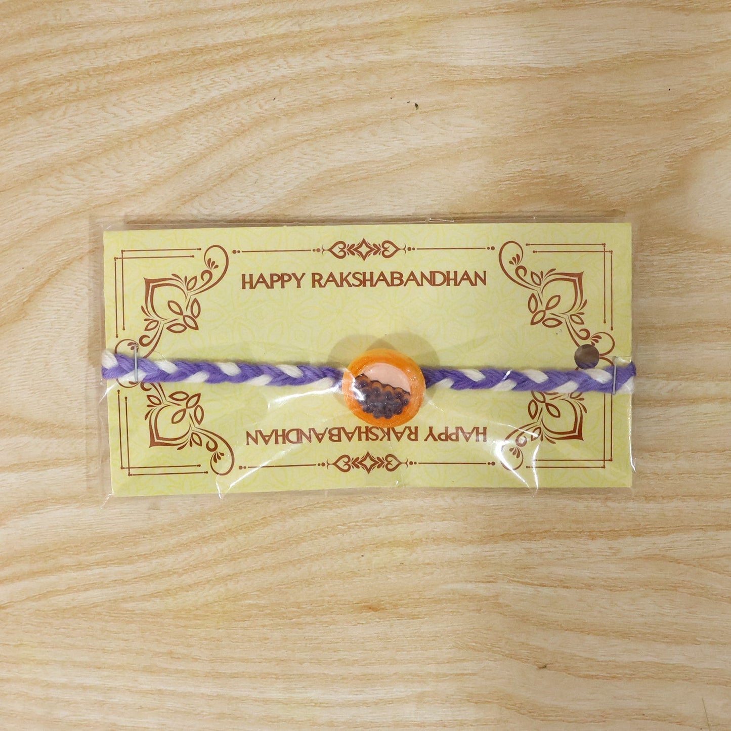 Colorful braided thread Rakhi with vibrant design and traditional motifs