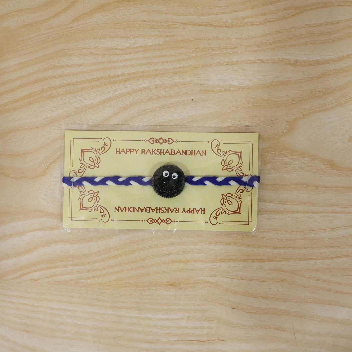Full view of stylish Rakhi for brothers on white background