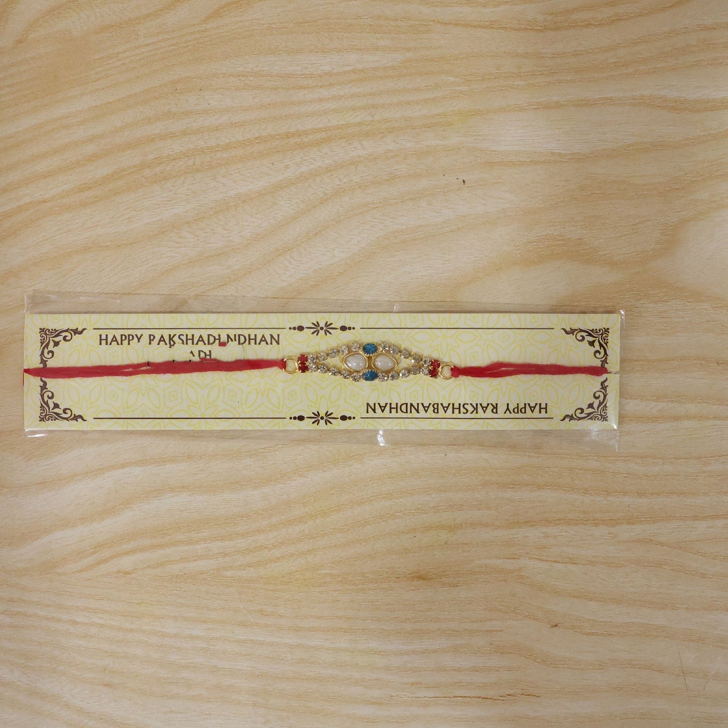 American Diamond & Pearl Rakhi worn on wrist for Raksha Bandhan