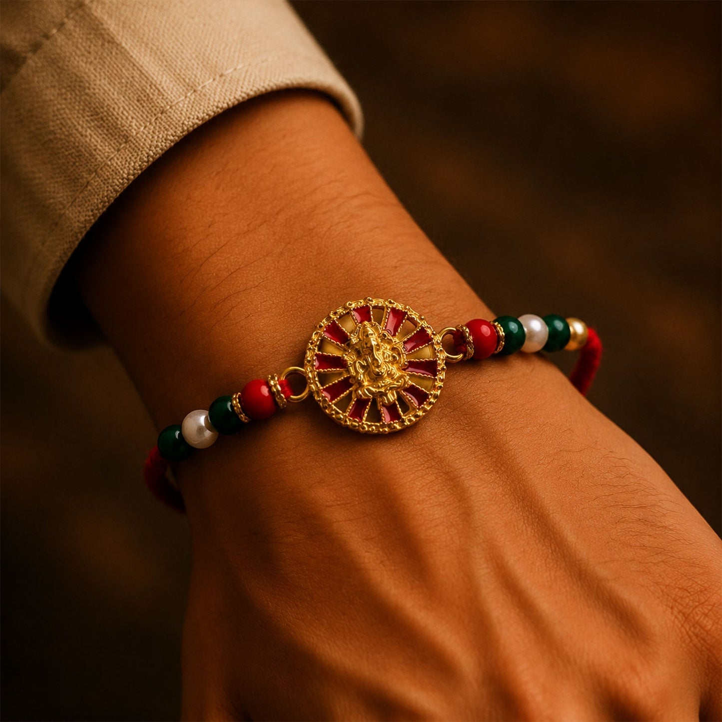 Stylish traditional Ganesha wheel Rakhi for brother with intricate detailing