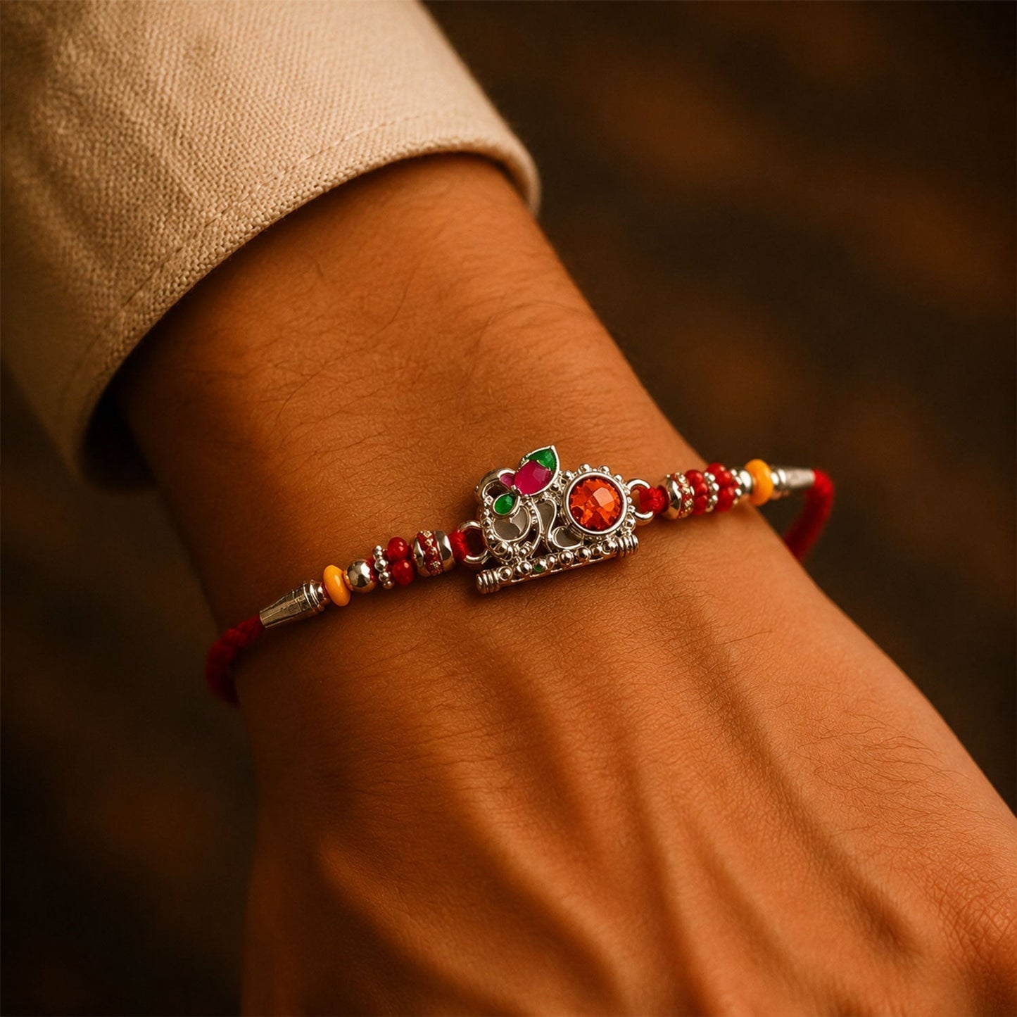 Colorful Om symbol rakhi for kids with decorative beads