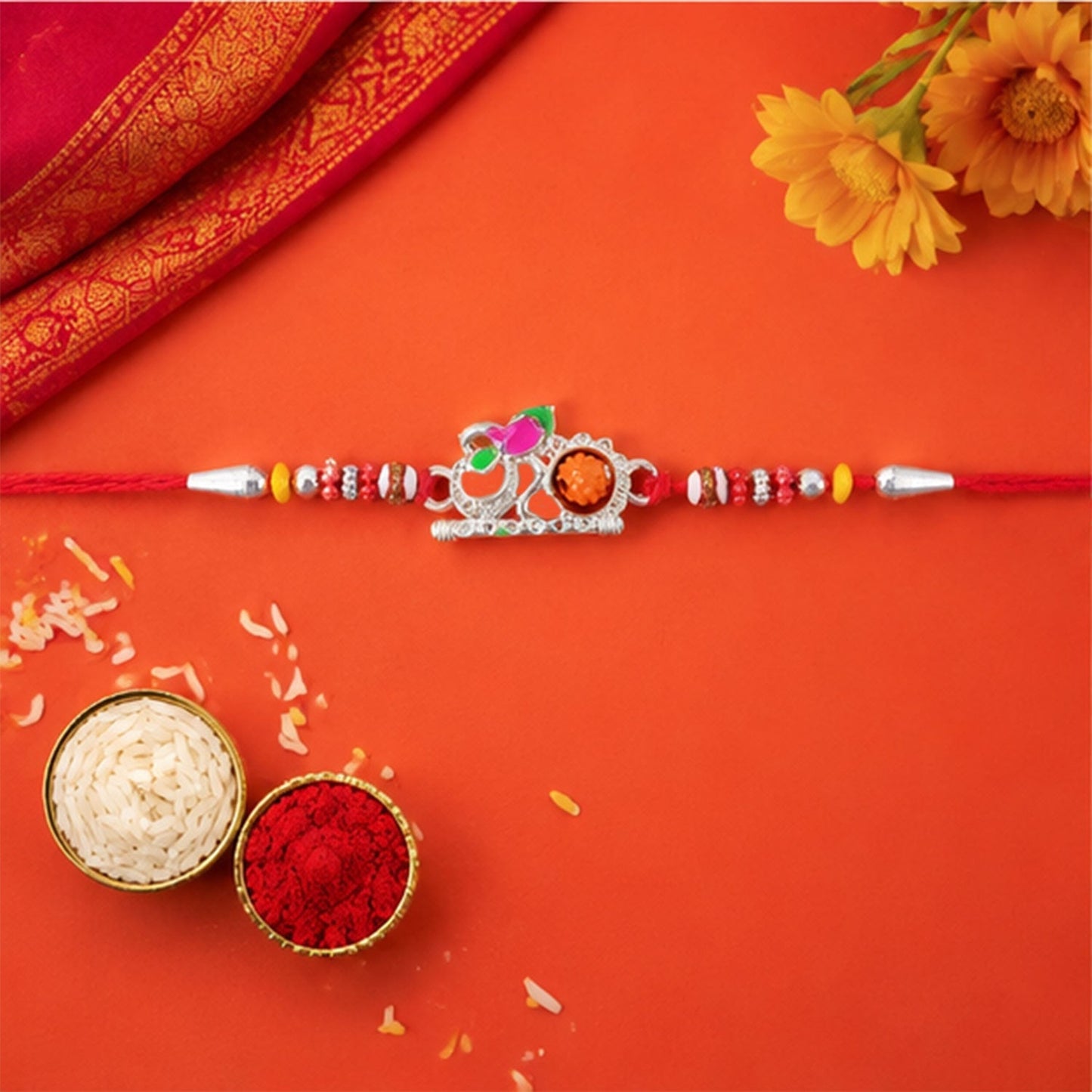 Close-up of colorful Om kids rakhi with intricate detailing