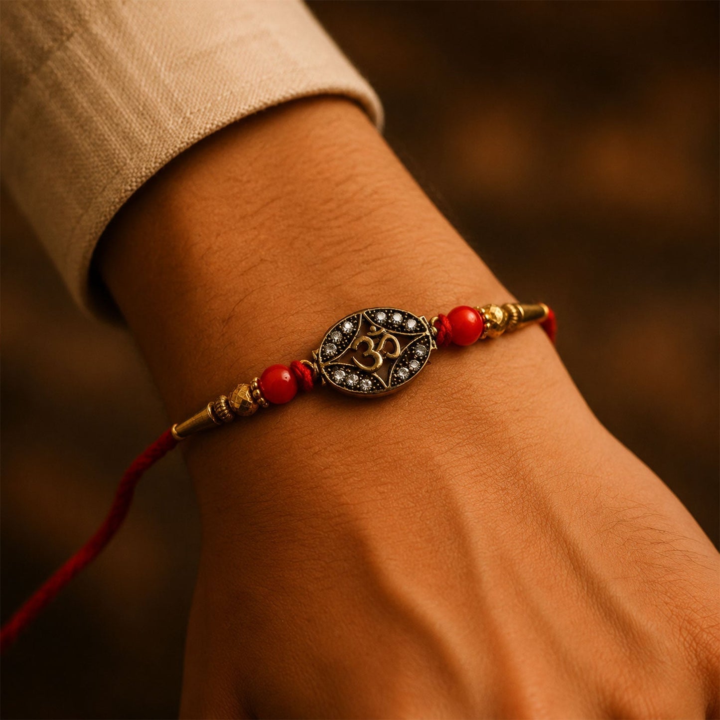 Stylish traditional Om rakhi with detailed finishing and decorative elements