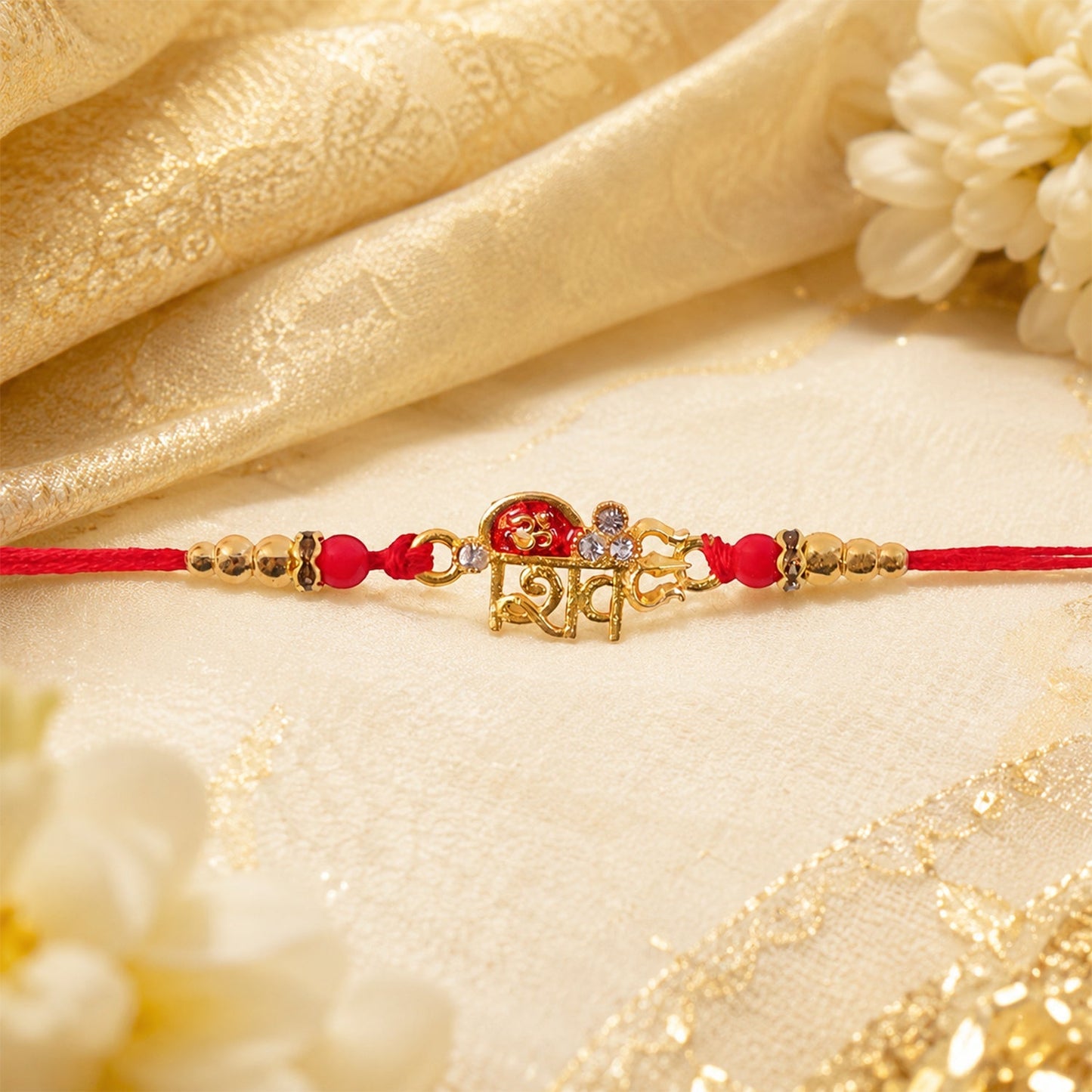 Festive golden Rakhi with elegant finish, perfect as Raksha Bandhan gift
