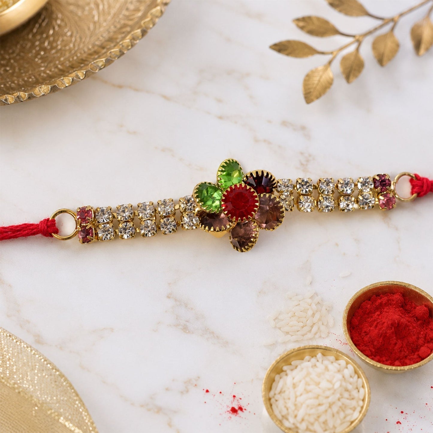 Traditional yet modern colourful Rakhi with intricate floral motifs.