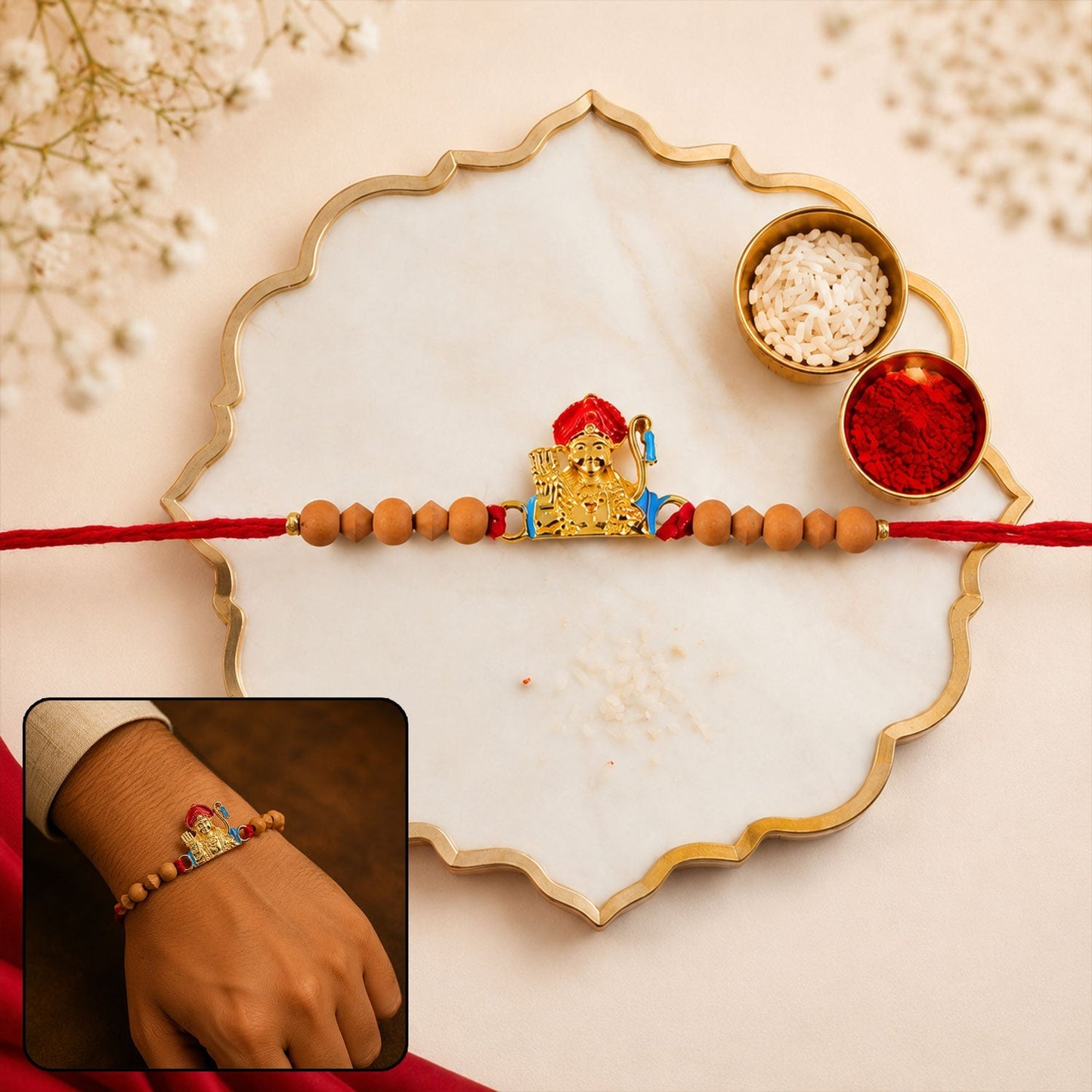 Close-up of the auspicious Rakhi for Brother with golden deity and sandalwood beads.
