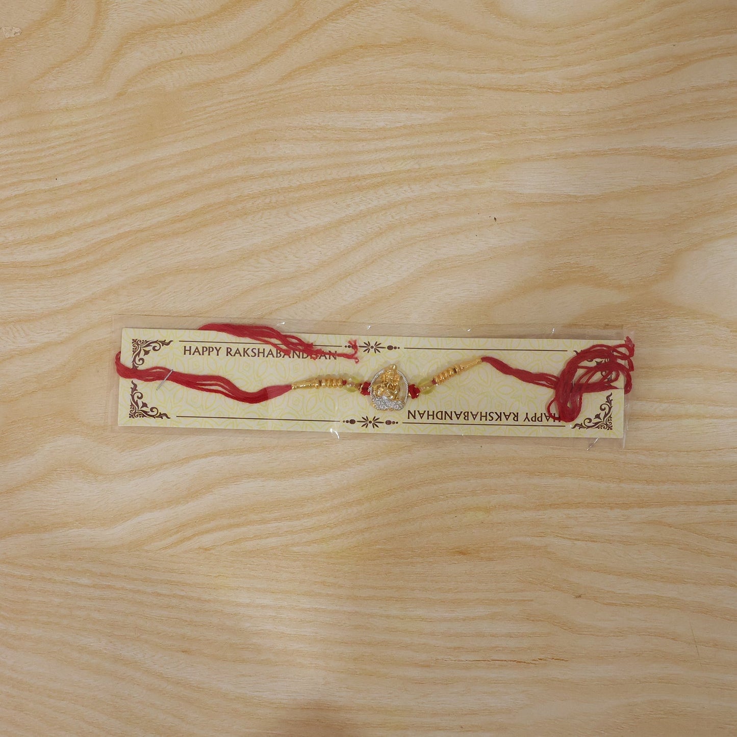 Back view of Bal Krishna Rakhi showing comfortable thread tie.