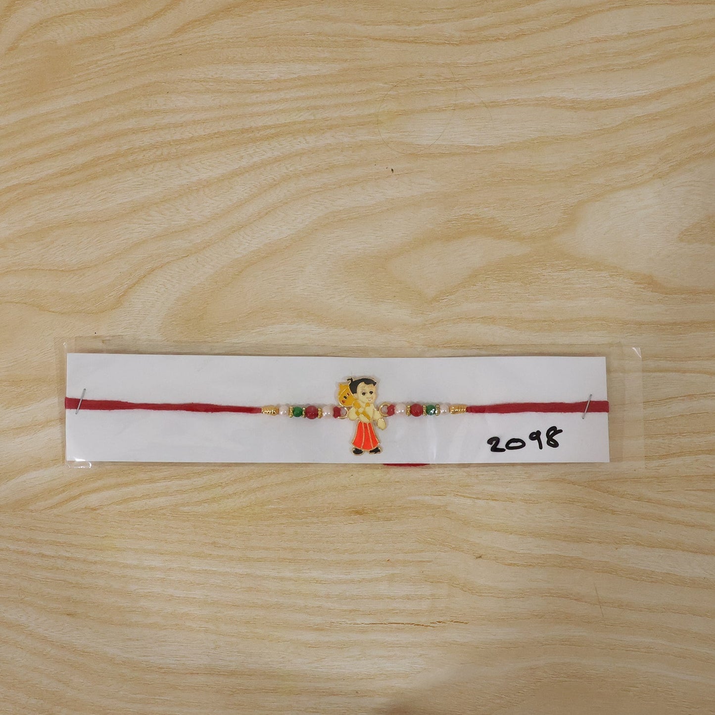Front view of cheerful Chhota Bheem Rakhi, perfect for kids.
