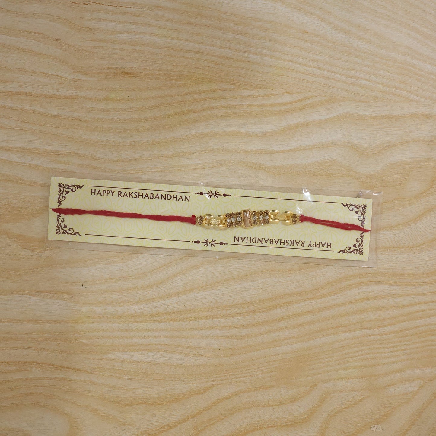 Traditional yet modern AD Stone Rakhi for Rakshabandhan celebration.
