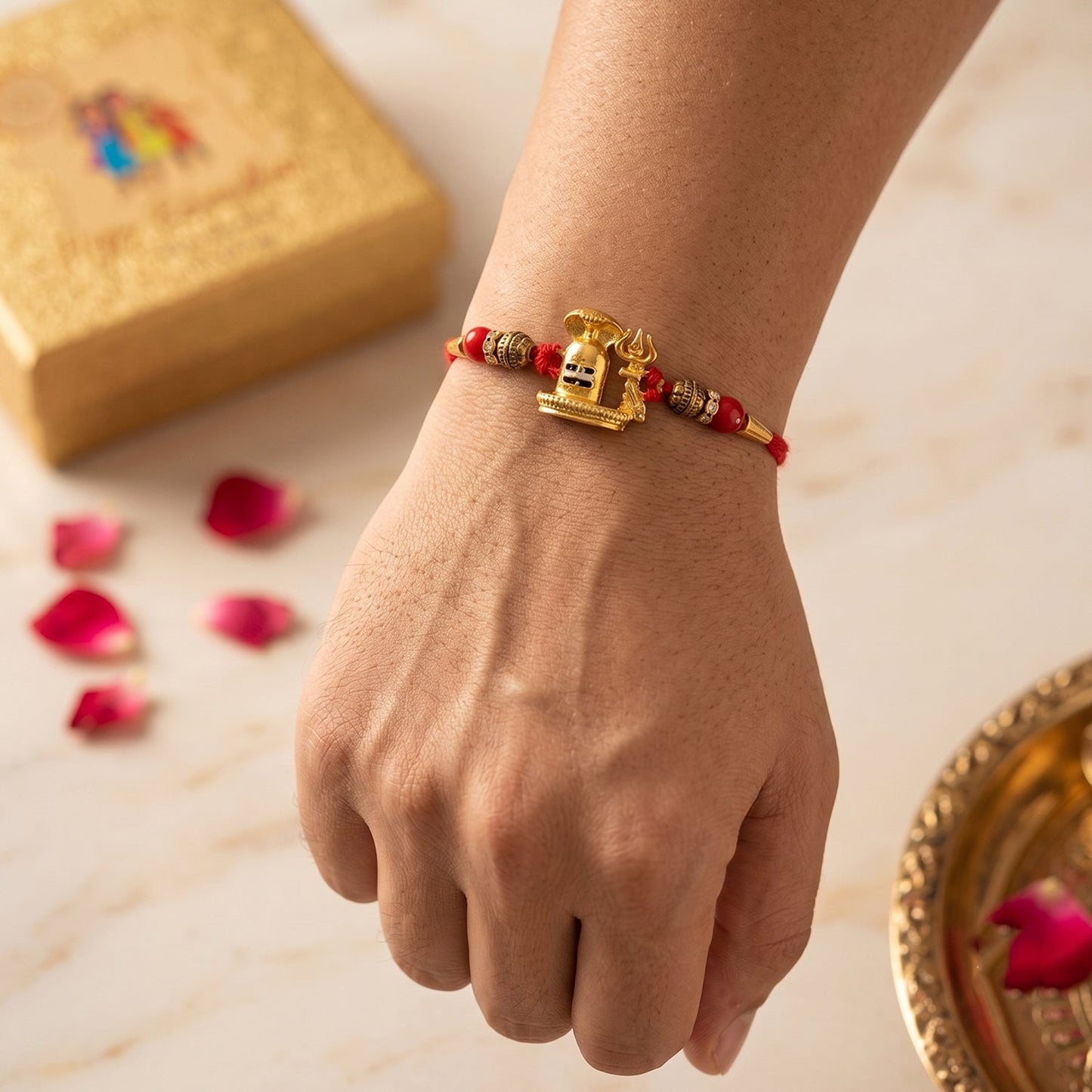 Shivling Rakhi displayed from a side angle, highlighting its intricate design.