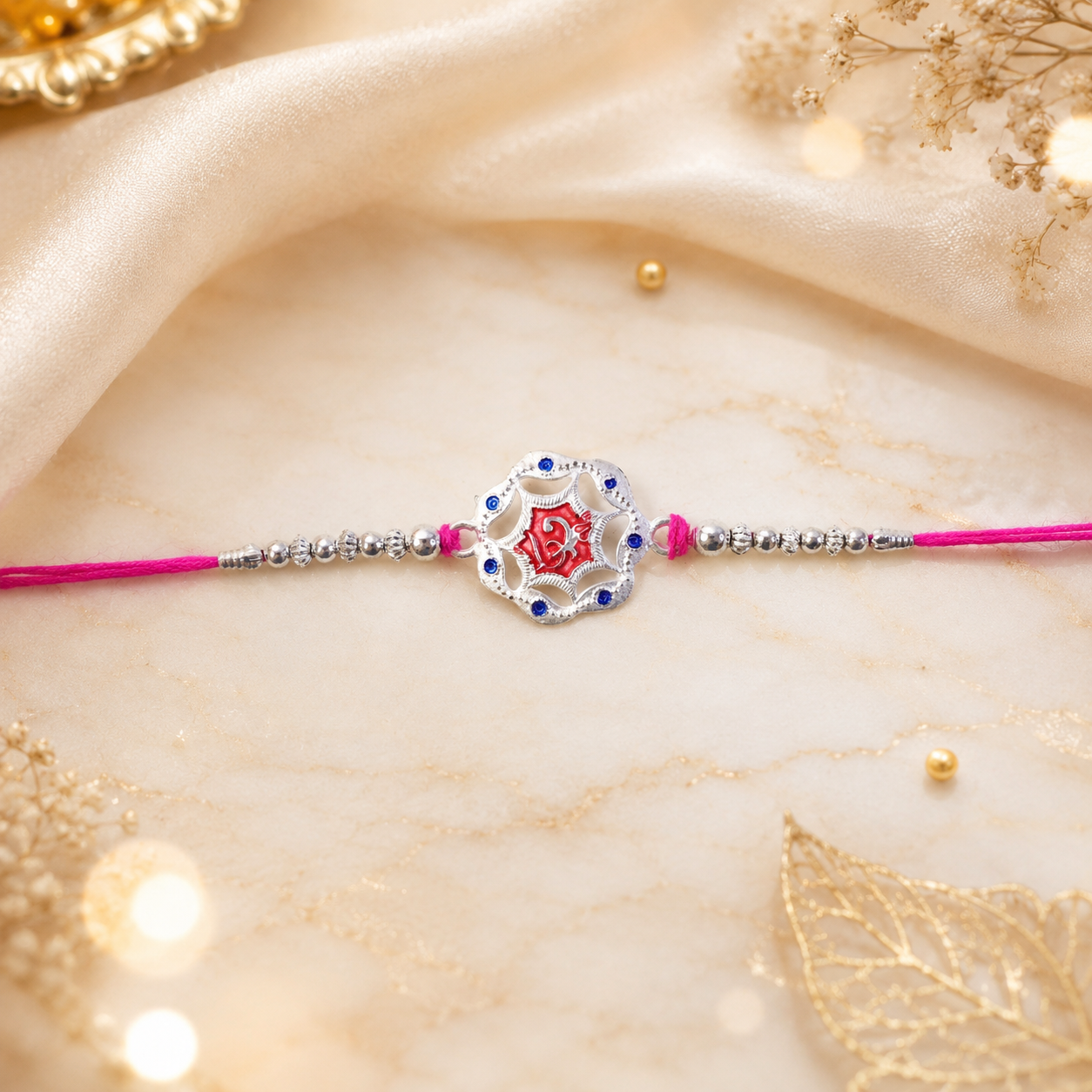 The designer floral rakhi displayed against a festive background, ready for gifting.