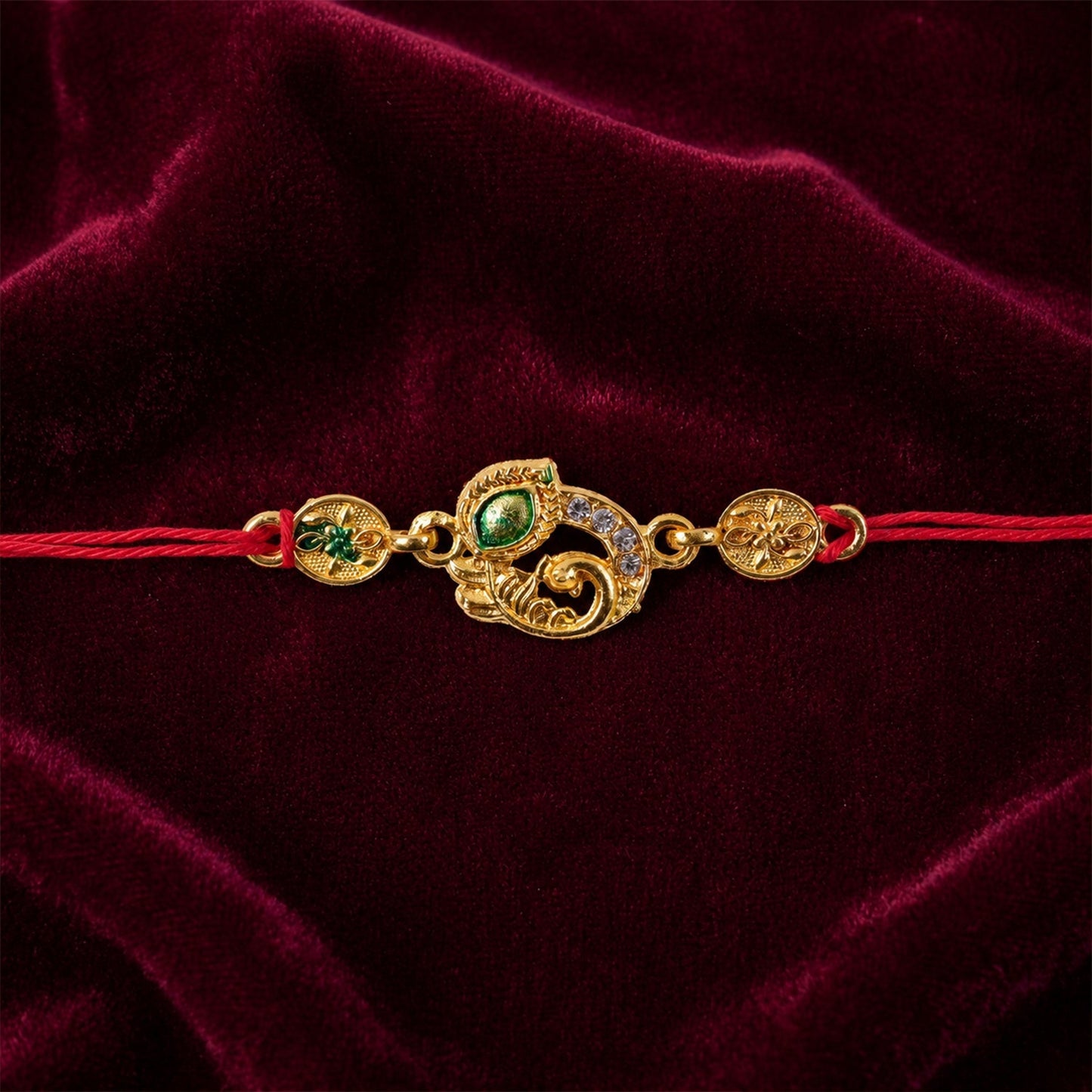 Meenakari Rakhi with golden thread, ideal for gifting to a brother.