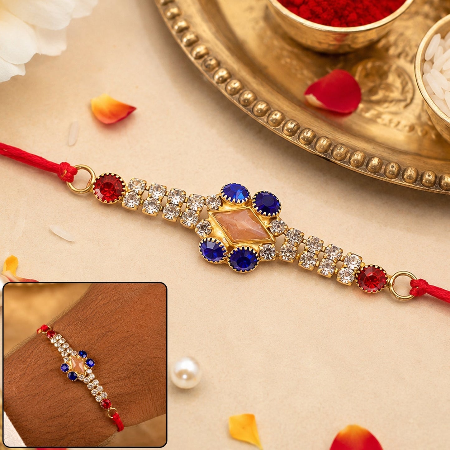 Elegant AD Stone Rakhi in royal blue and white, perfect for Raksha Bandhan.