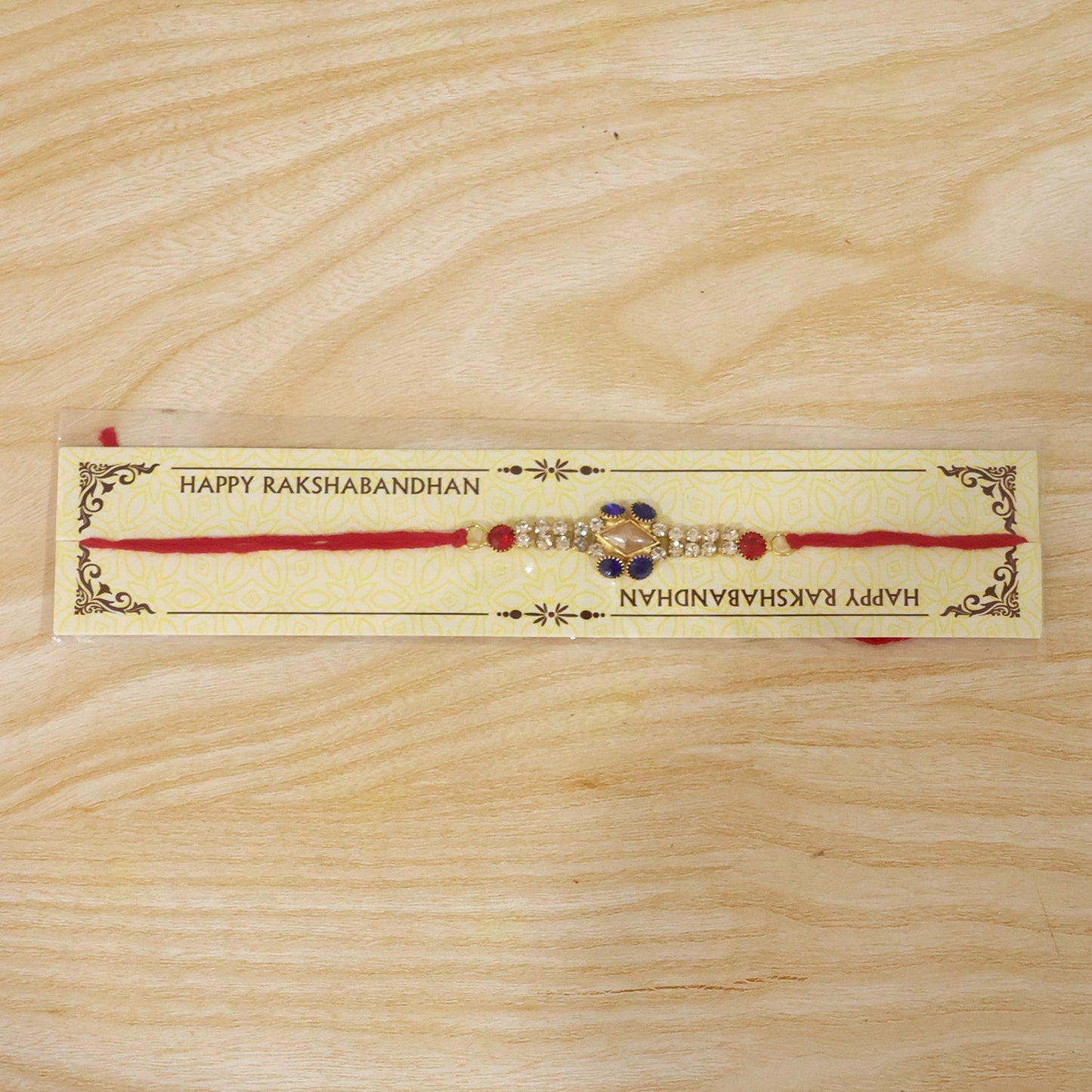 Beautifully crafted AD Stone Rakhi, ready to gift.