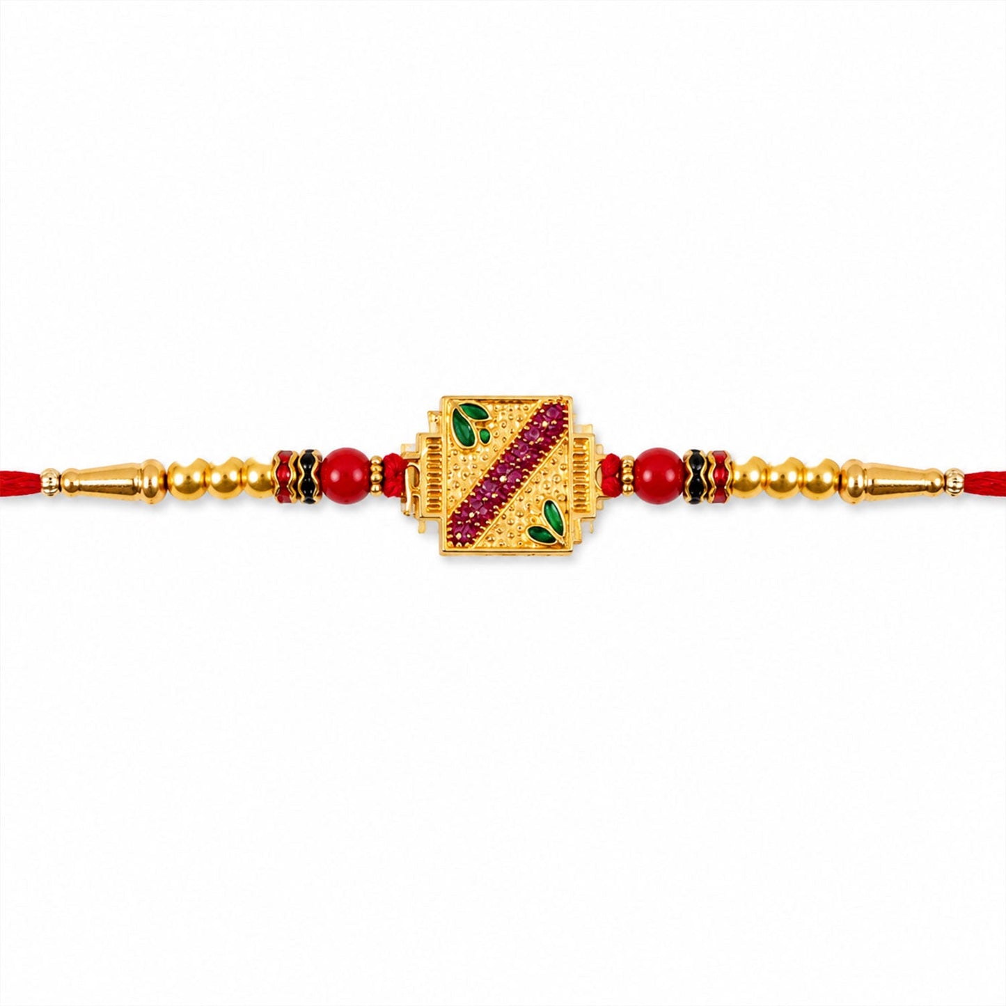 Hand holding the designer golden square Meenakari Rakhi, ready for festival tying.