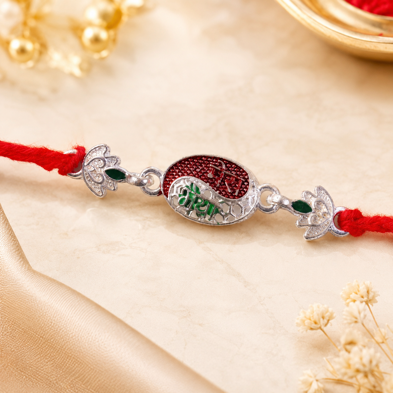 Detailed view of thread and finish of the silver Meenakari Rakhi.