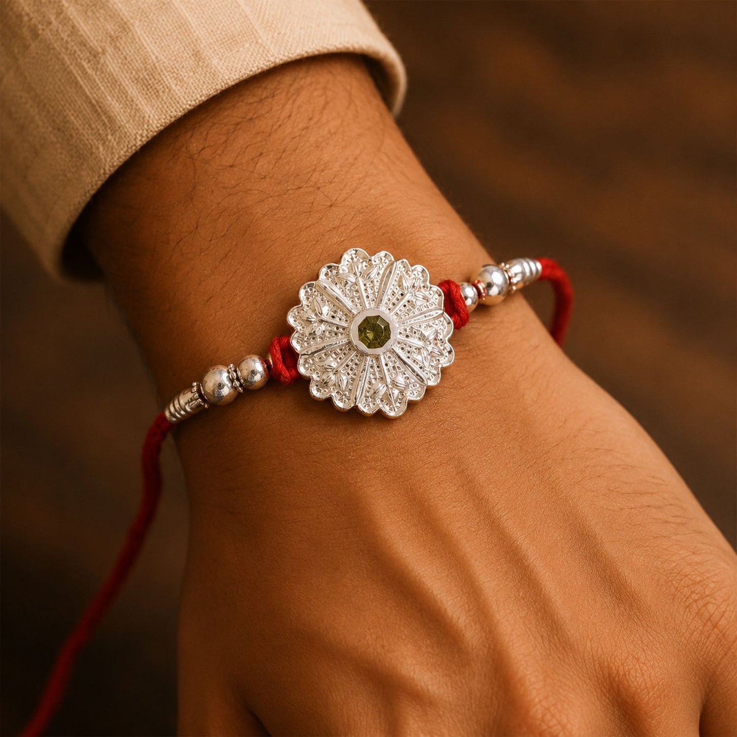 Beautiful oxidised silver mandala rakhi with green stones for sibling gifting