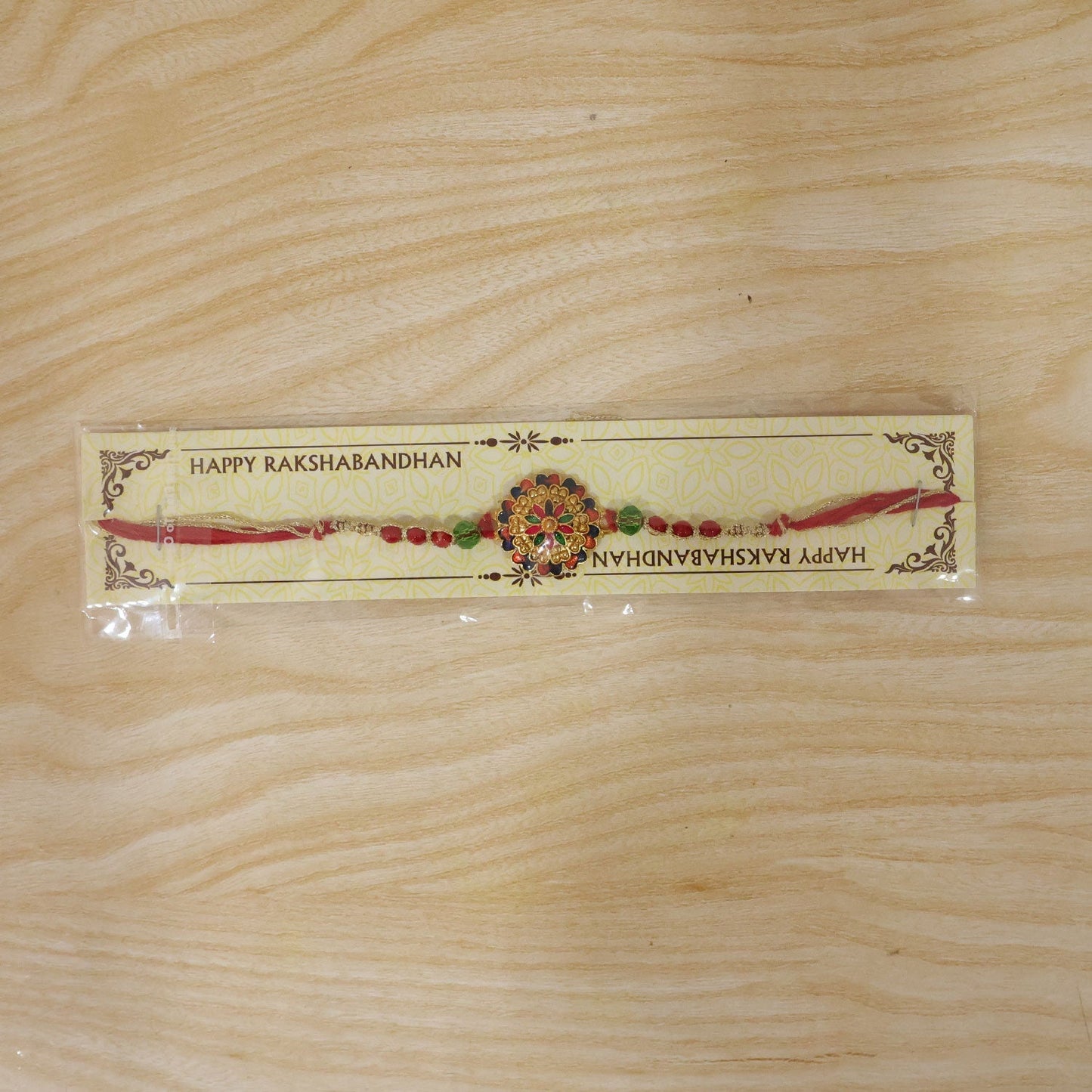 Stylish Meenakari Rakhi packaged for gifting to your beloved brother.