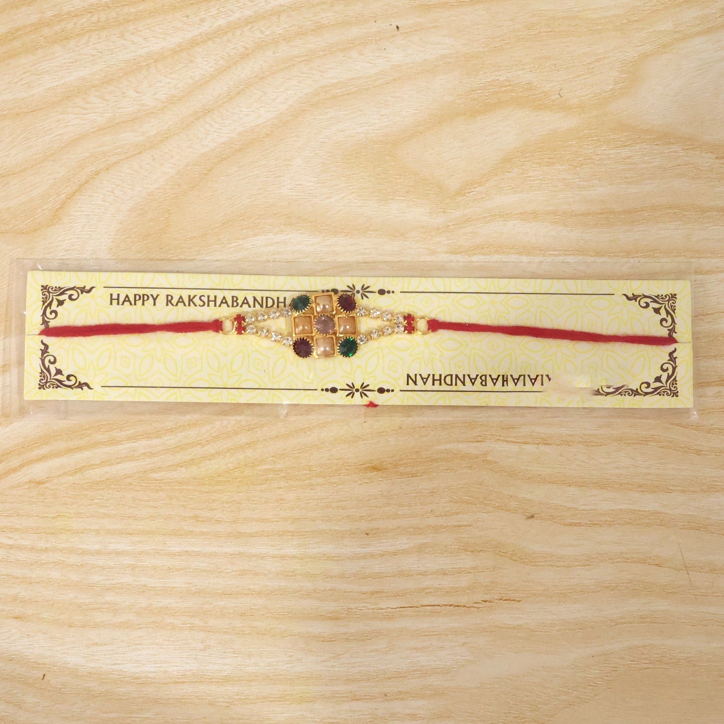 Beautifully crafted Rakhi with vibrant colors and detailed finishing