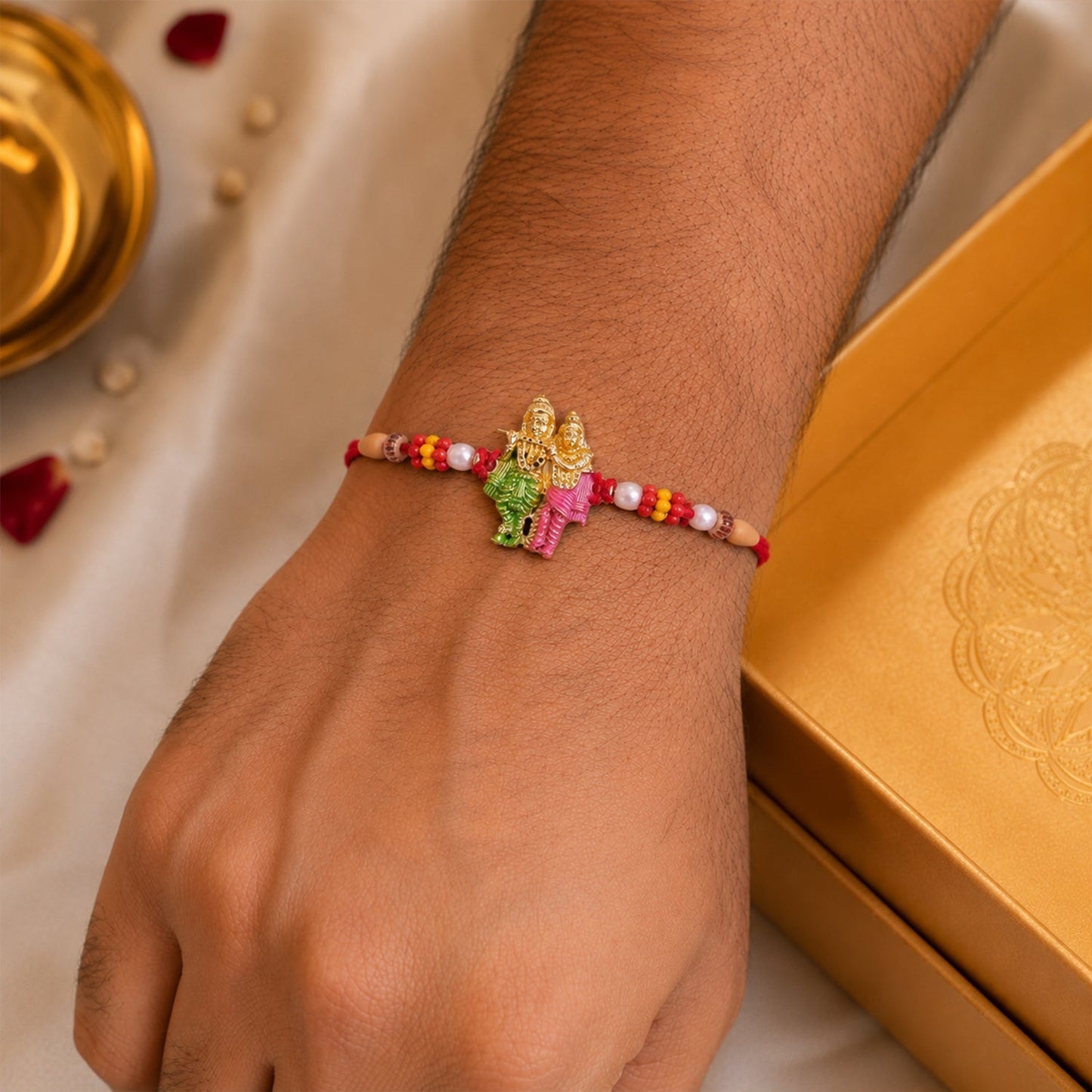 Stylish traditional rakhi featuring a decorative bead design