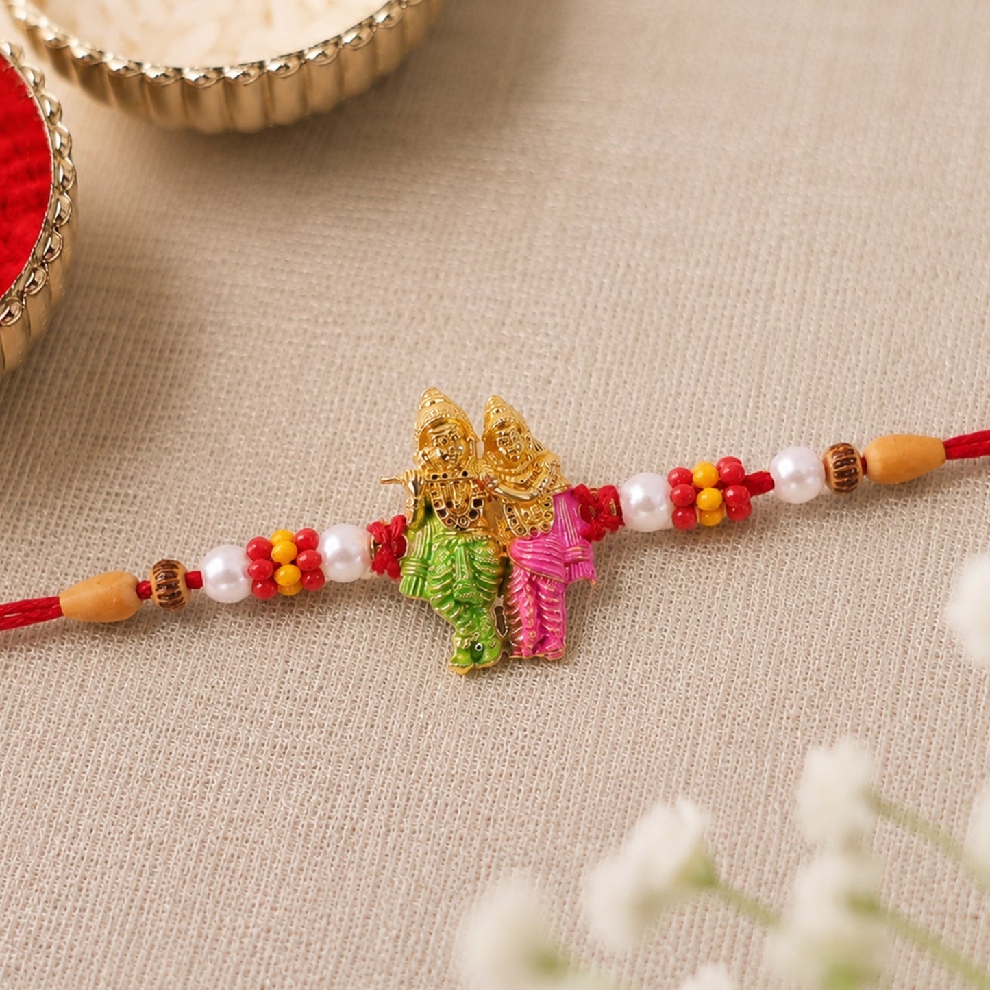 Elegant rakhi with modern festive appeal and bead accents