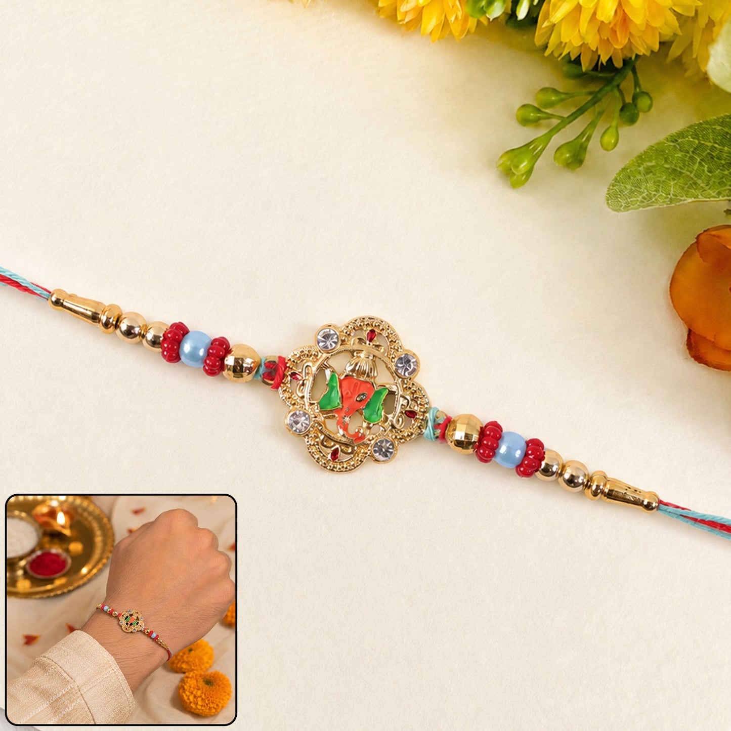Vibrant kundan rakhi with floral and green peacock design, front view.
