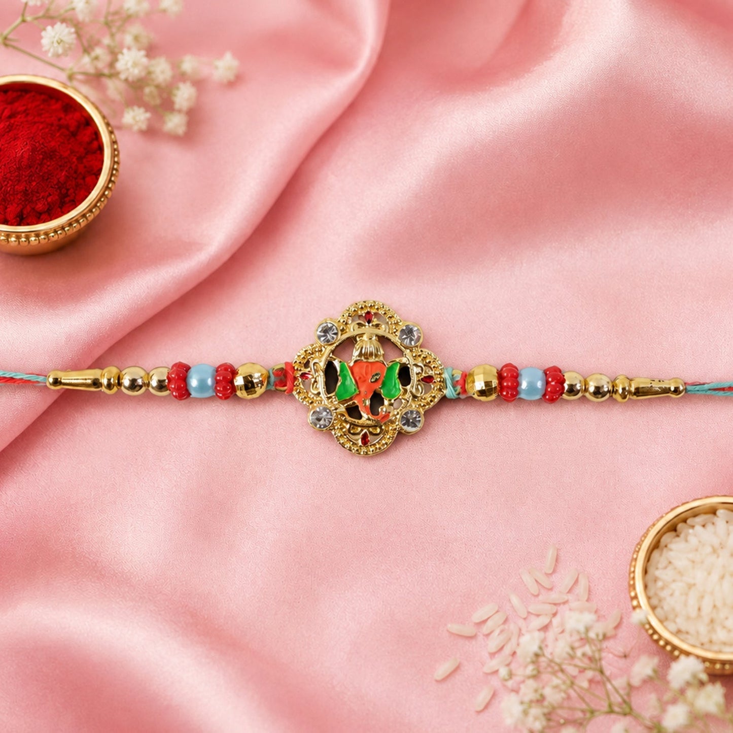 Lightweight kundan rakhi tied on wrist, highlighting comfort.