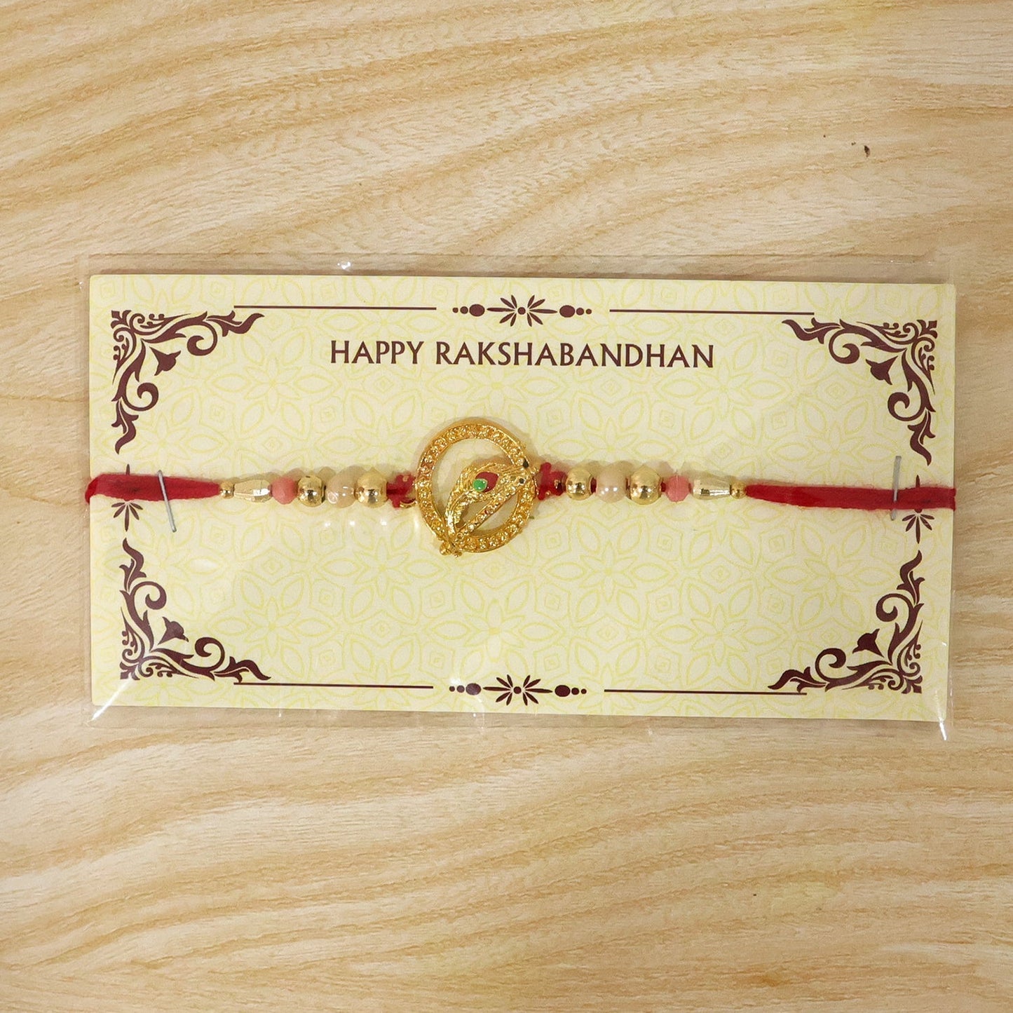 Stylish and traditional decorative beads rakhi with spiral design for Rakhi