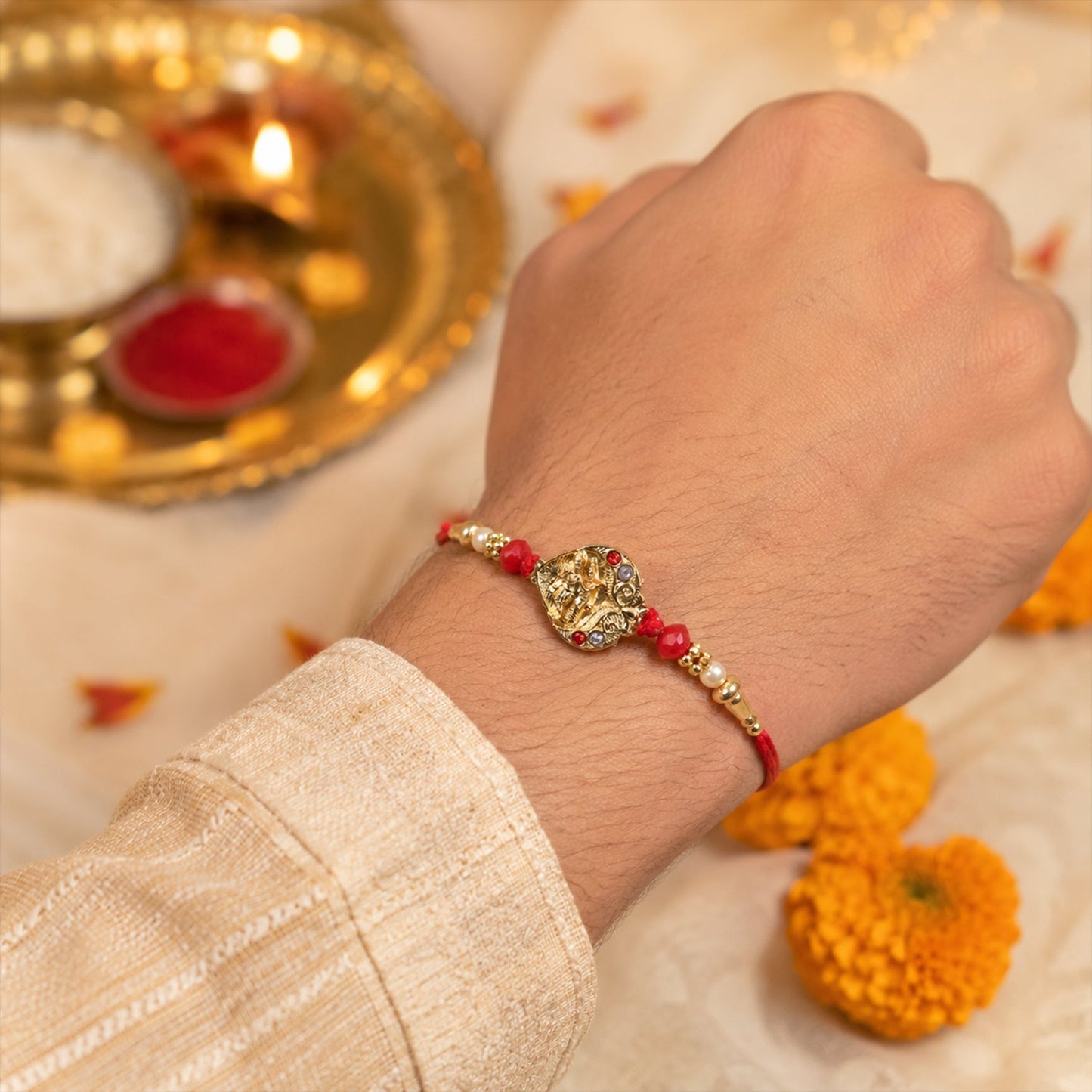 Elegant designer thread rakhi with colorful decorative elements.