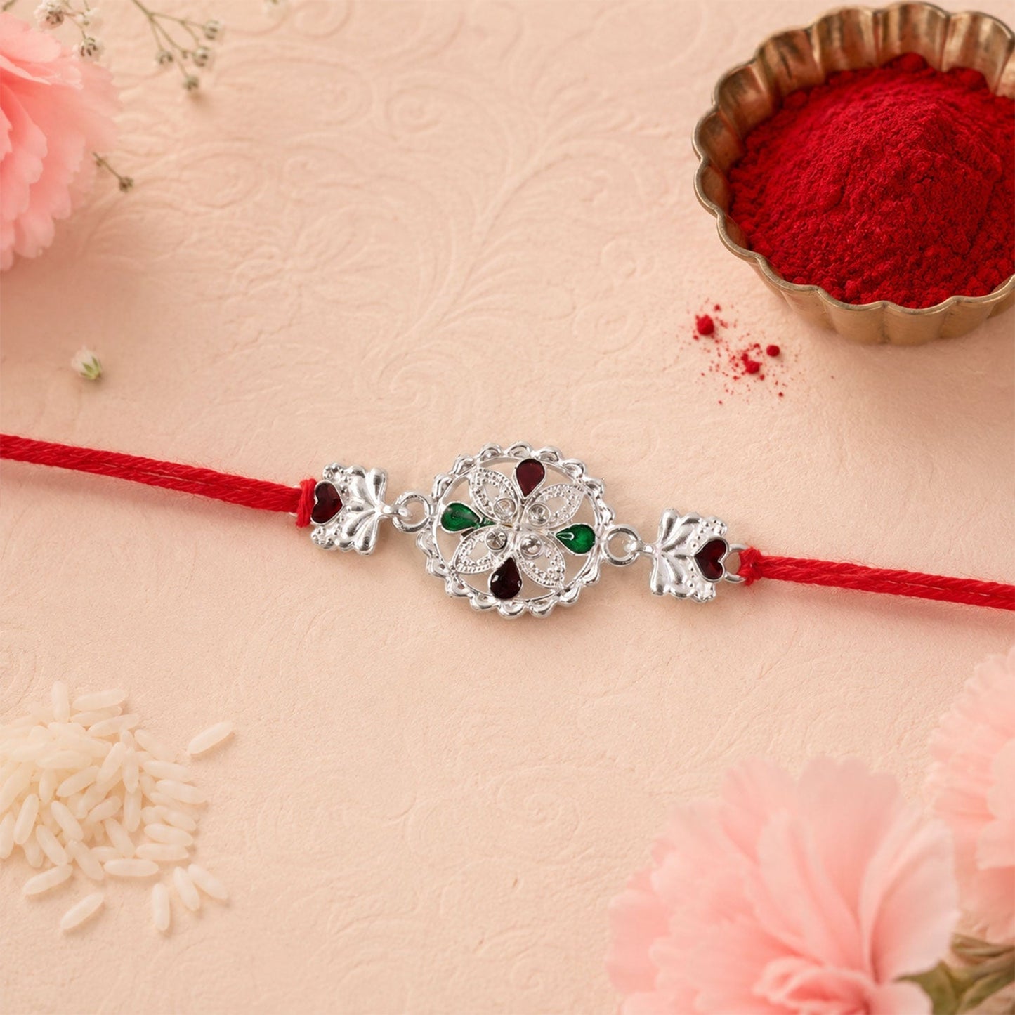 Close-up of Silver Floral Rakhi with intricate detailing