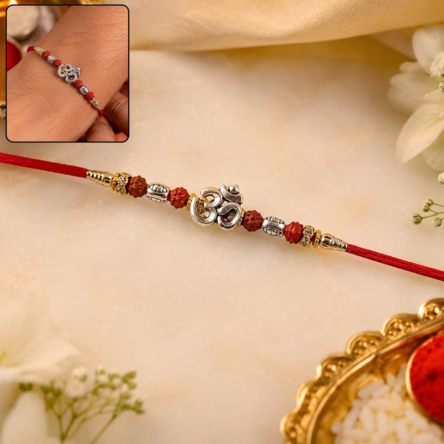 Close-up of the sacred Om Rudraksha Rakhi with silver charm and beads.