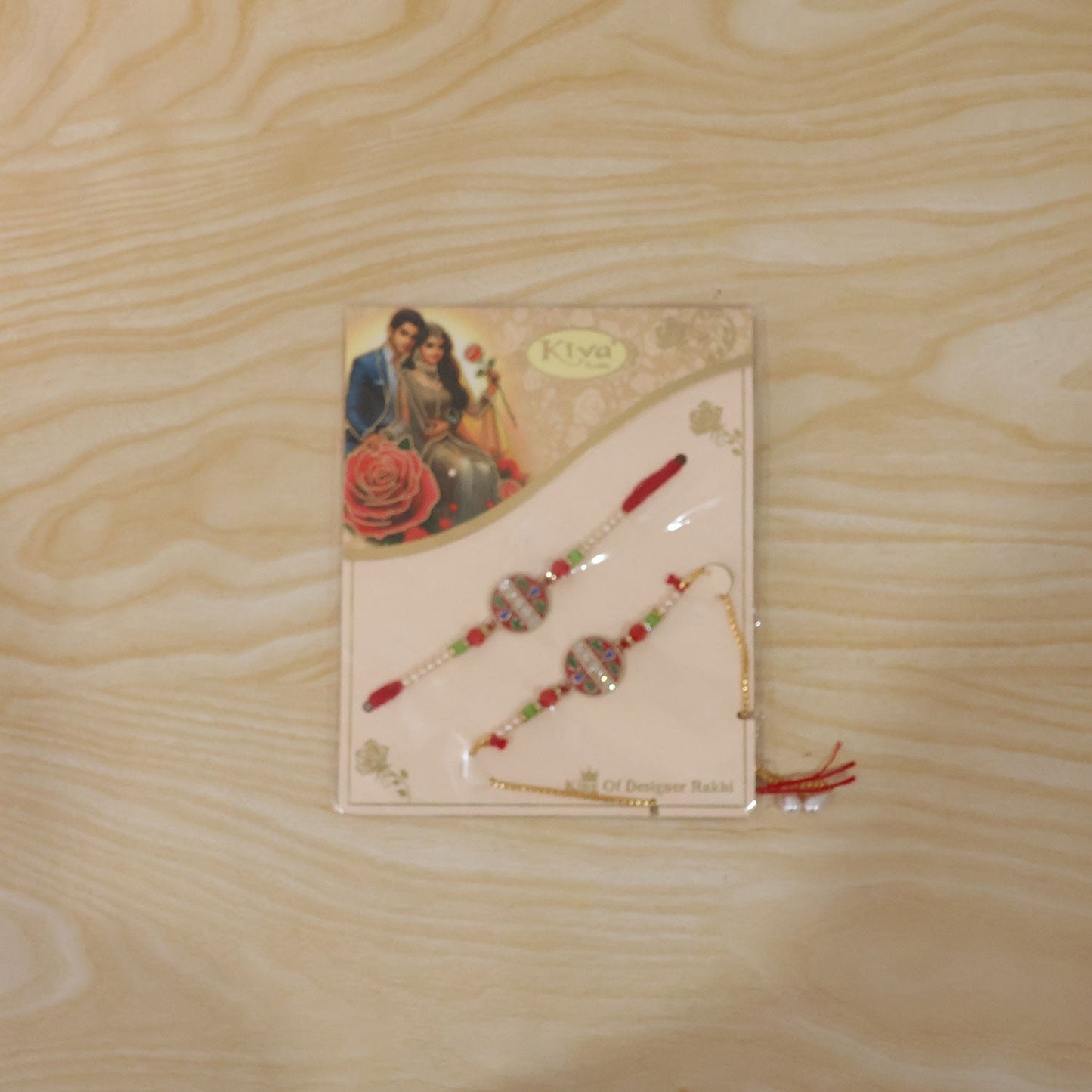 Beautifully crafted Bhabhi Rakhi with traditional motifs and shiny finish.