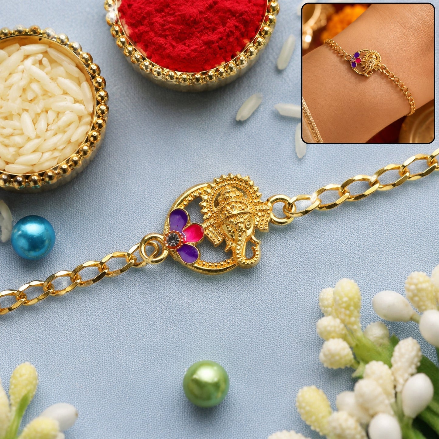 Lord Ganesha Rakhi bracelet with purple stone and gold tone details for Raksha Bandhan.
