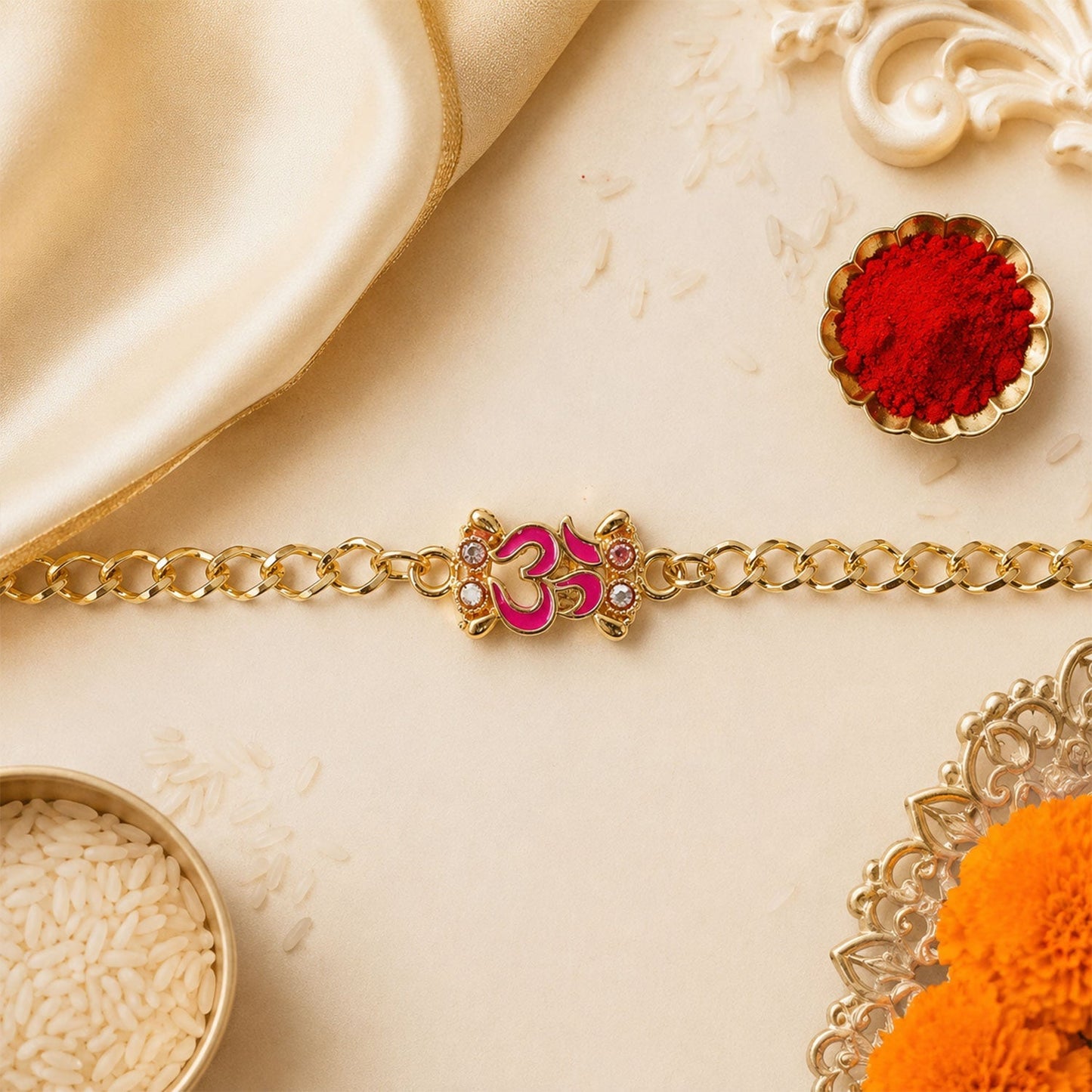 Traditional styled Om gold tone Rakhi bracelet with detailed craftsmanship