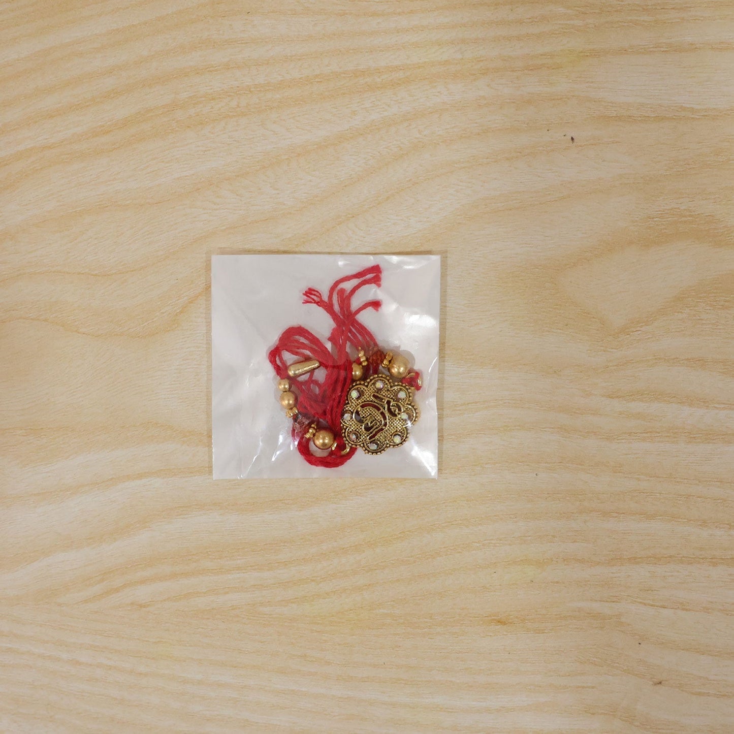 Elegant Rakhi with intricate stone design for Raksha Bandhan