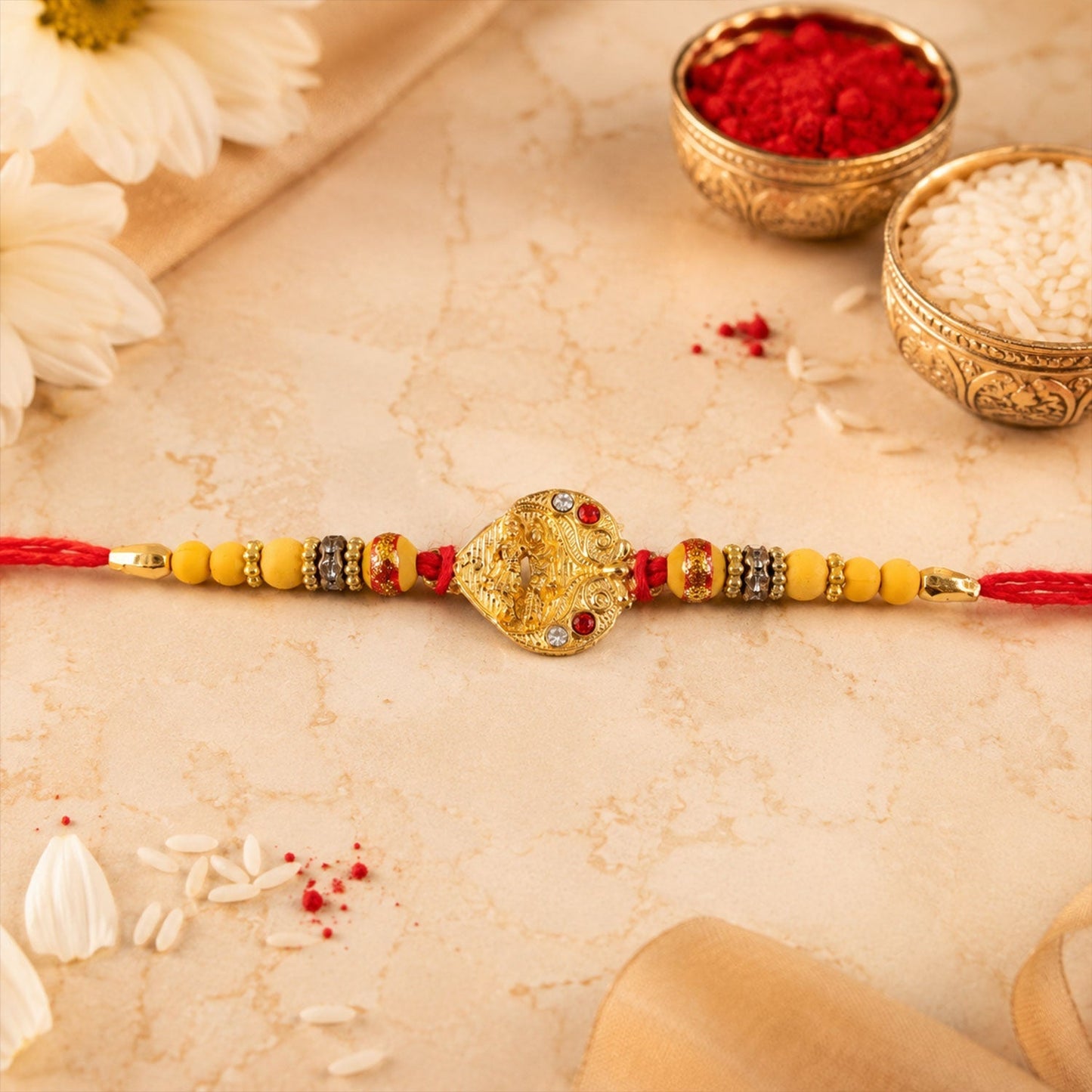 Golden Tone Rakhi showing detailed thread and design elements