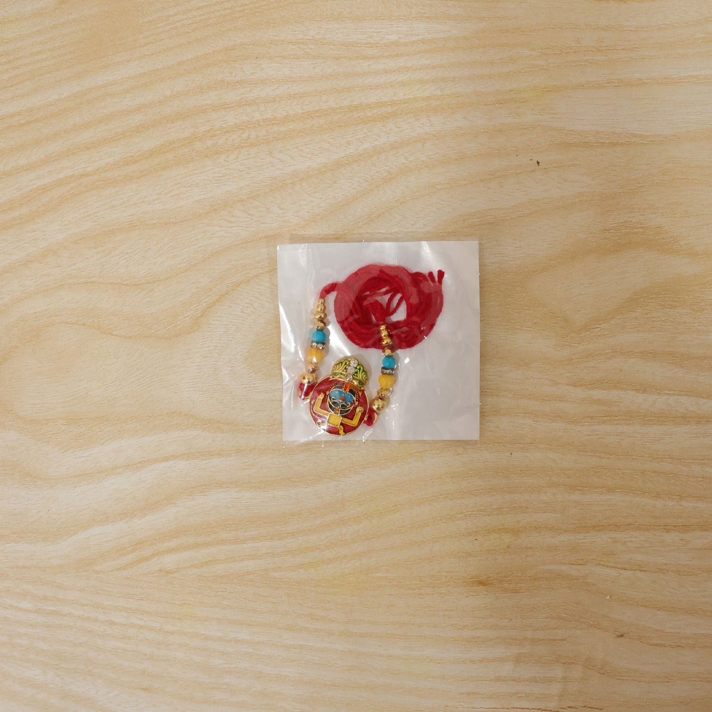 Children's Rakhi with vibrant enamel and cartoon character for festive celebrations