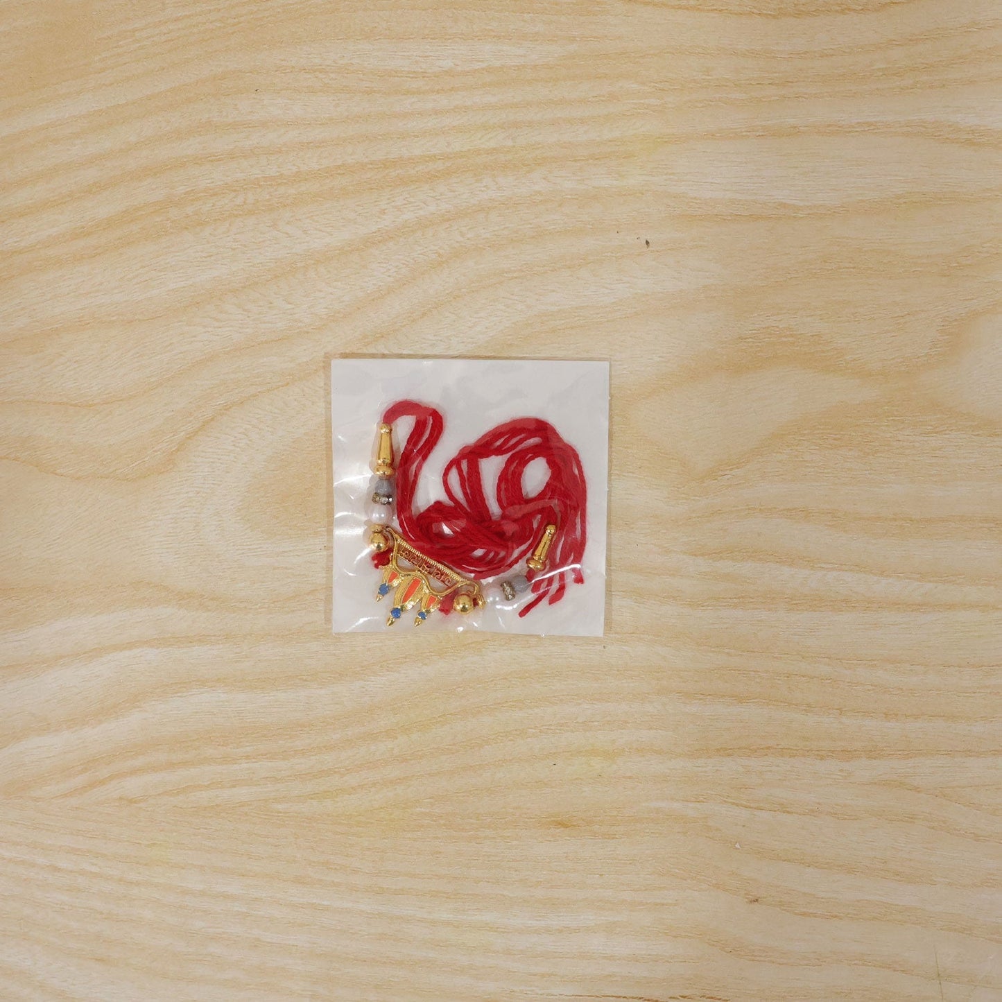 Festive Rakhi featuring vibrant Ram Mandir enamel design for brothers