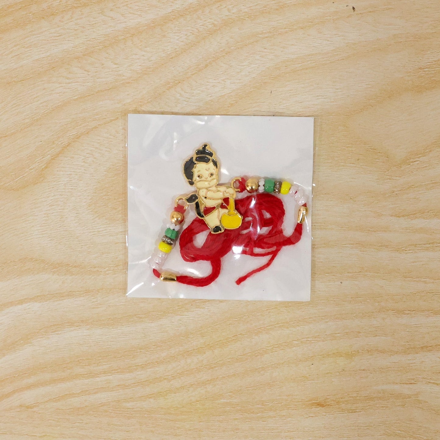 Festive bead Rakhi with Lord Hanuman, perfect for Raksha Bandhan celebration