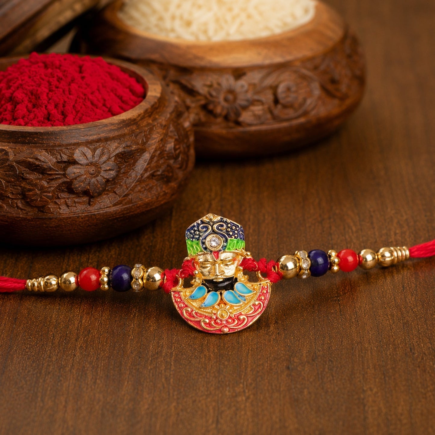 Beautiful multicolor enamel rakhi with gold-tone finish, perfect sibling gift for Rakhi festival