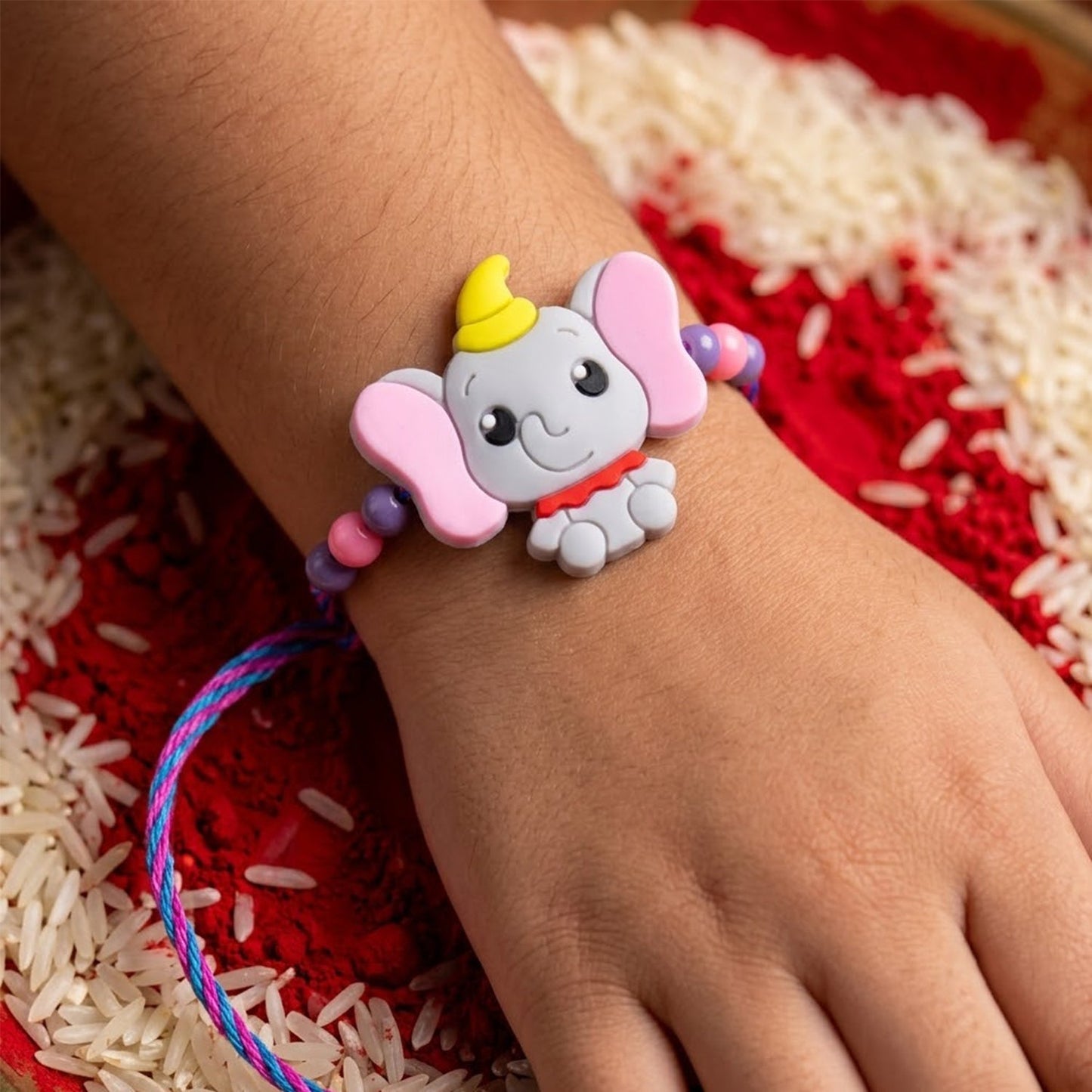 Side view of elephant kids rakhi with comfortable thread